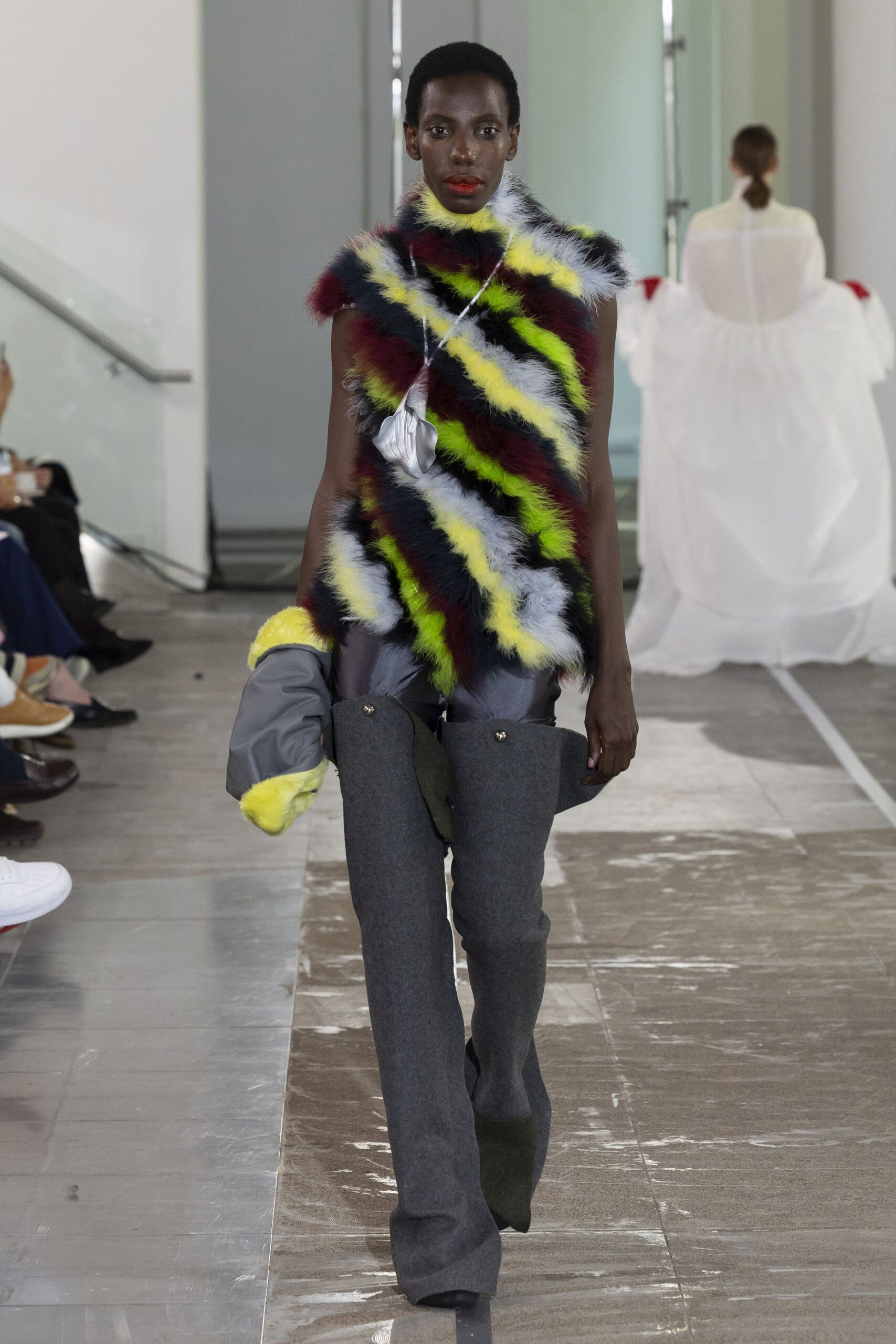 fitted fur top with gray pants