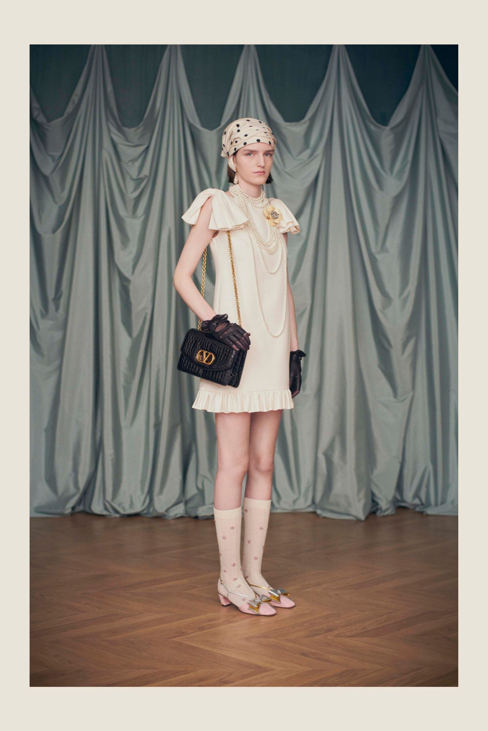 white ruffled mini dress with accessories