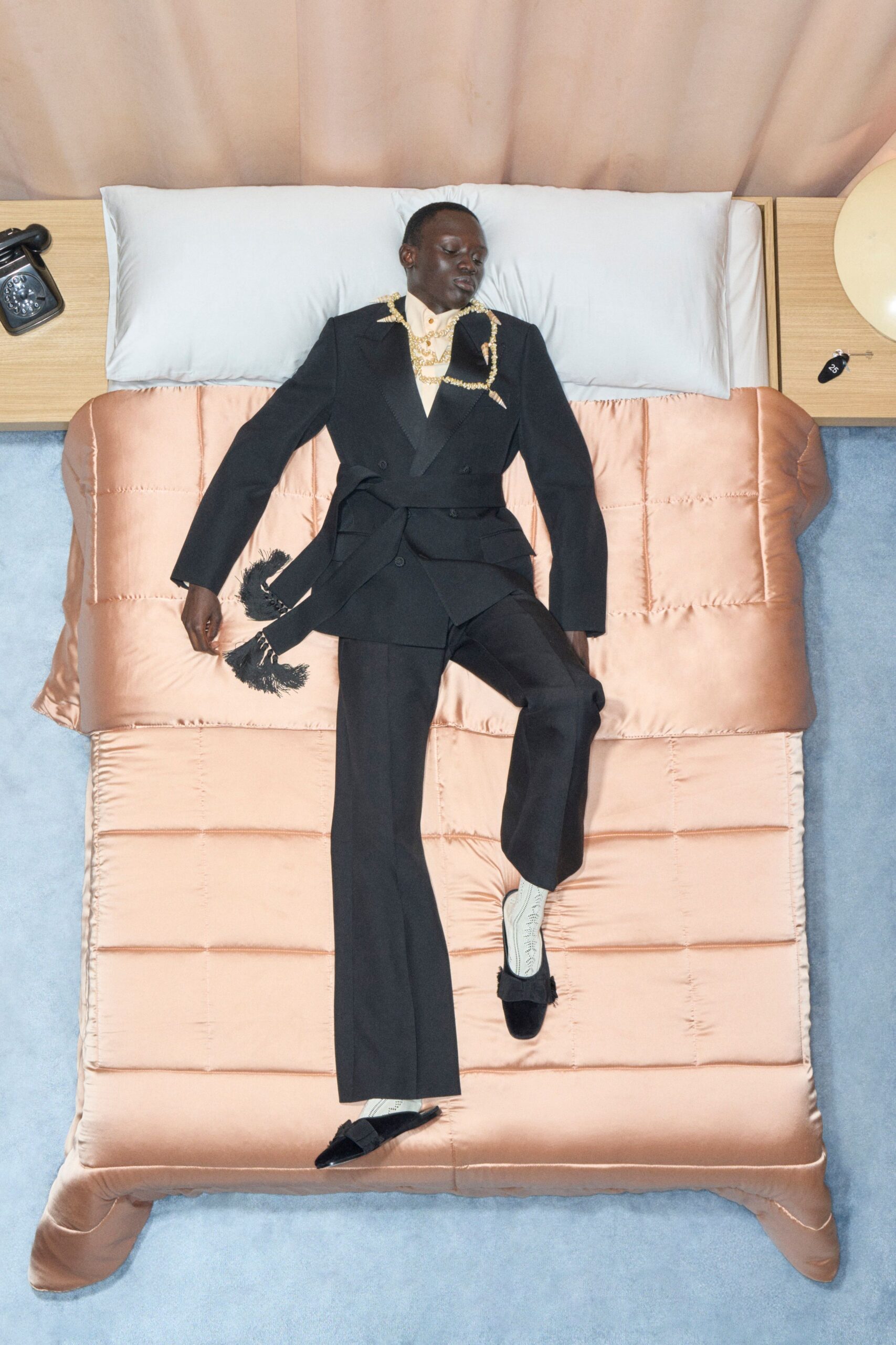black wool long-sleeve collared tailored buttoned suit