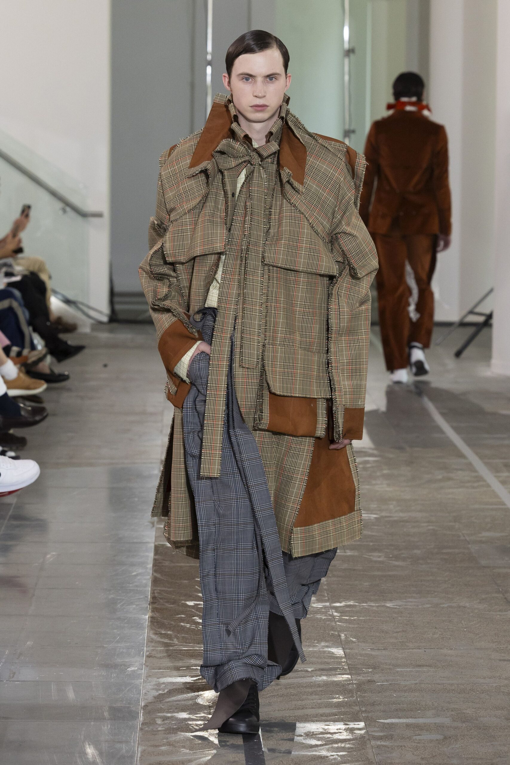 brown checked coat with gray pants