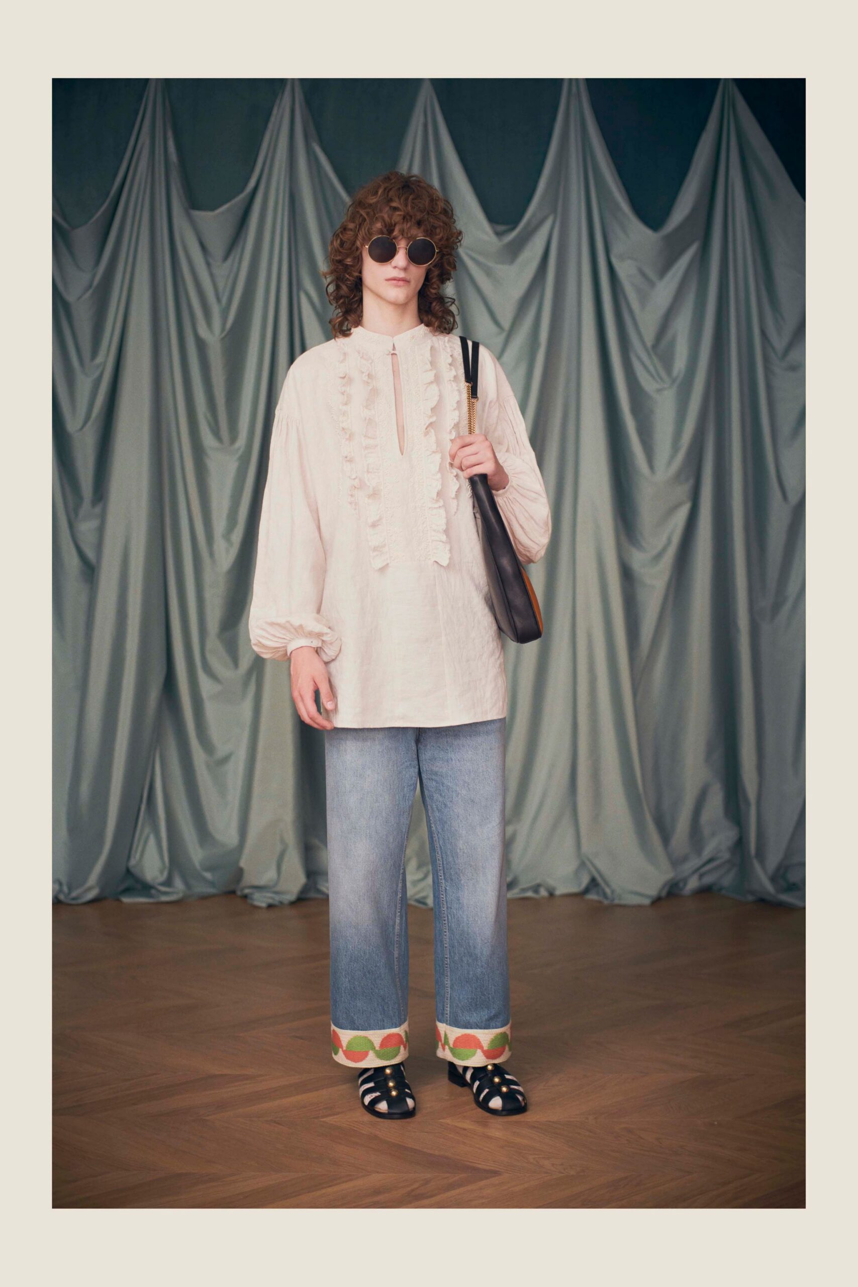 white ruffled shirt with denim pants
