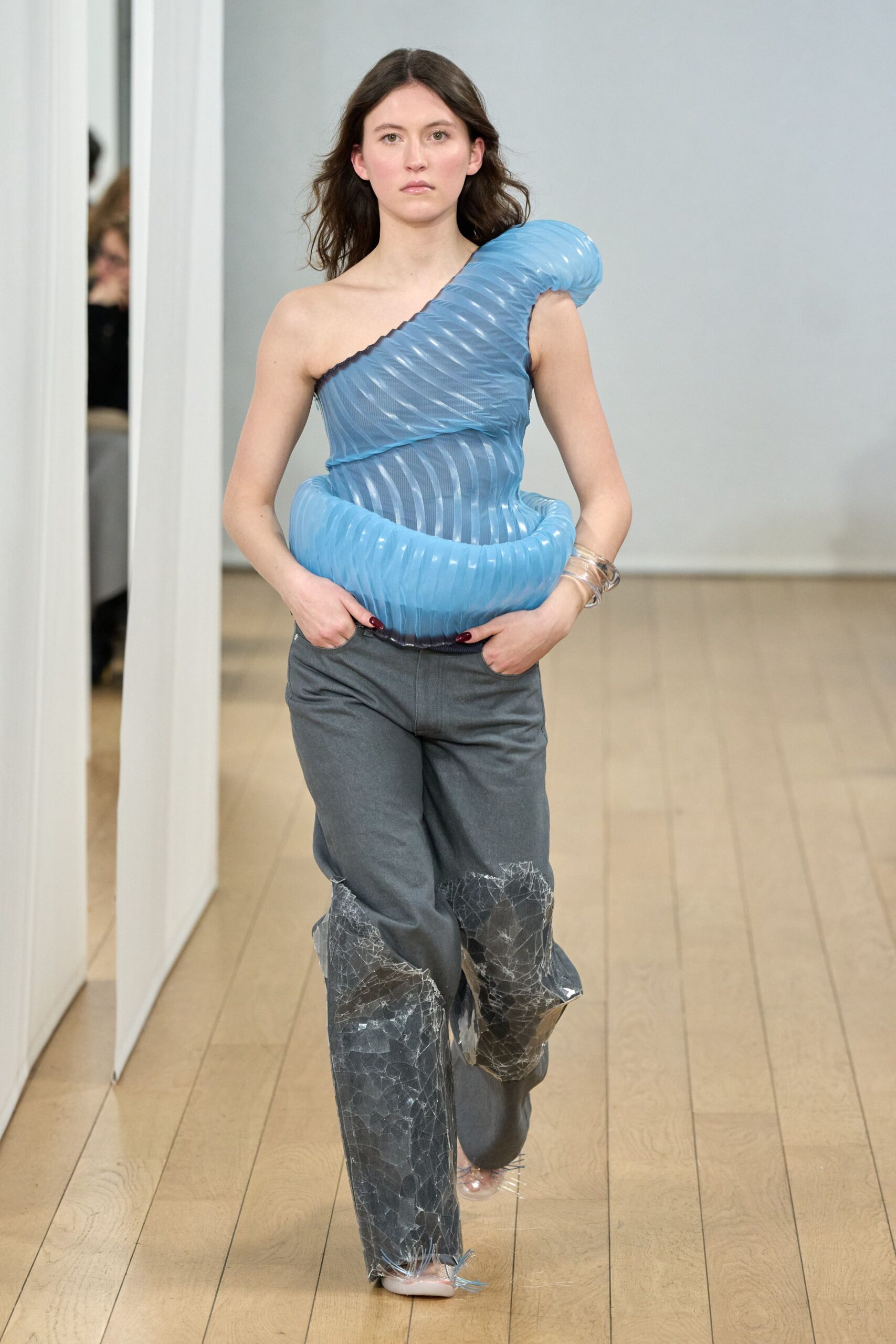blue vinyl asymmetric top with gray pants
