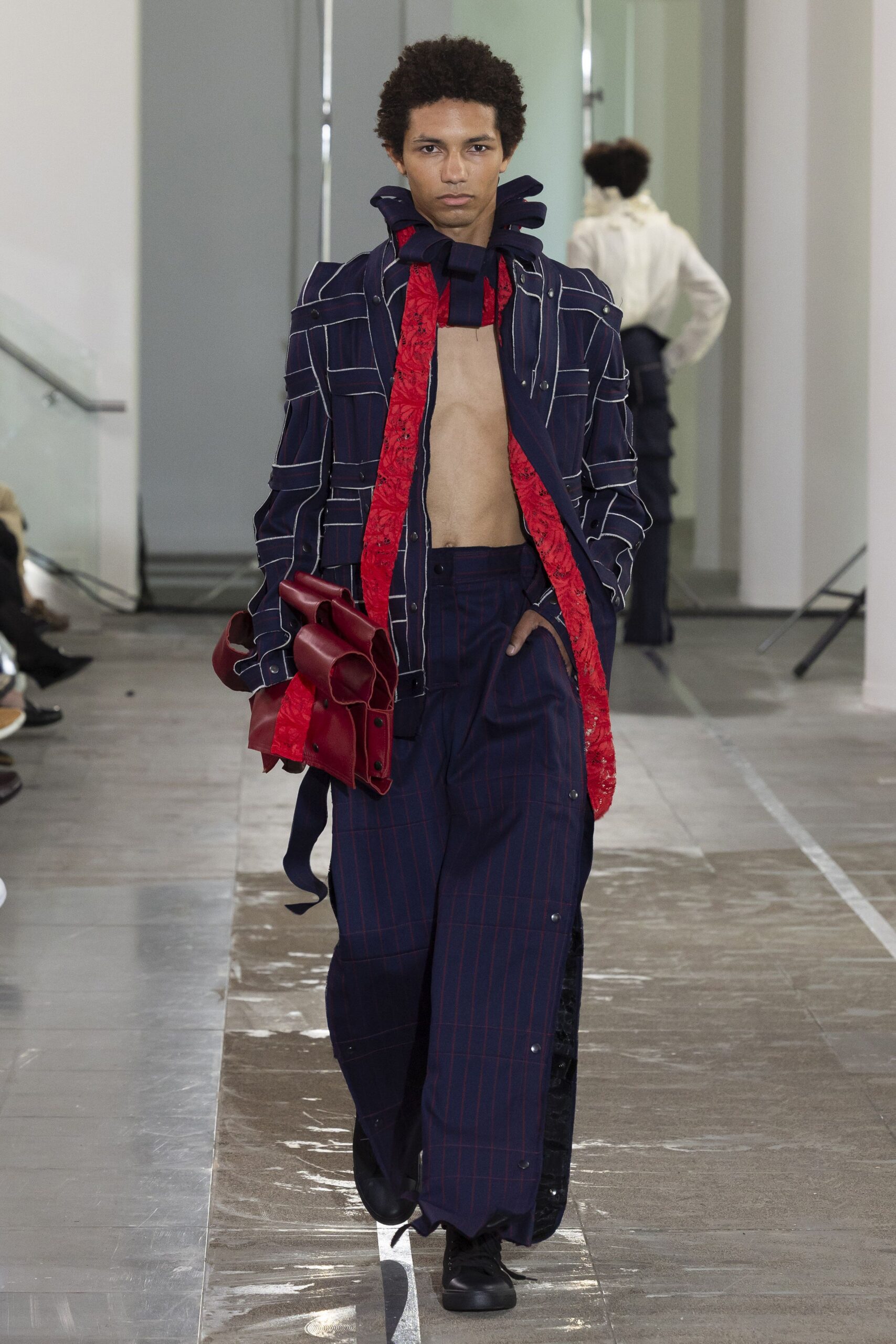 blue striped jacket with red details