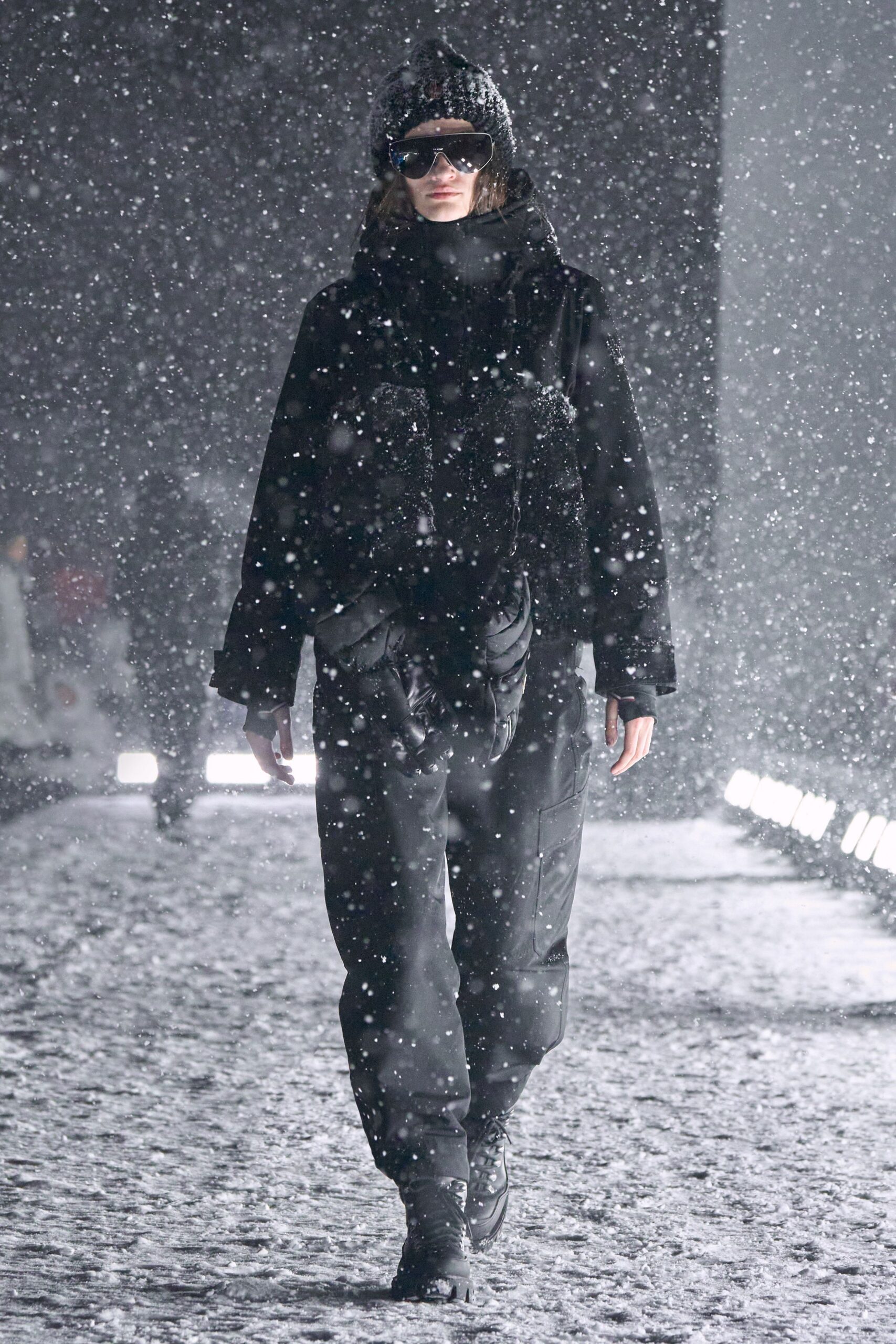 black faux-fur jacket with cargo pants