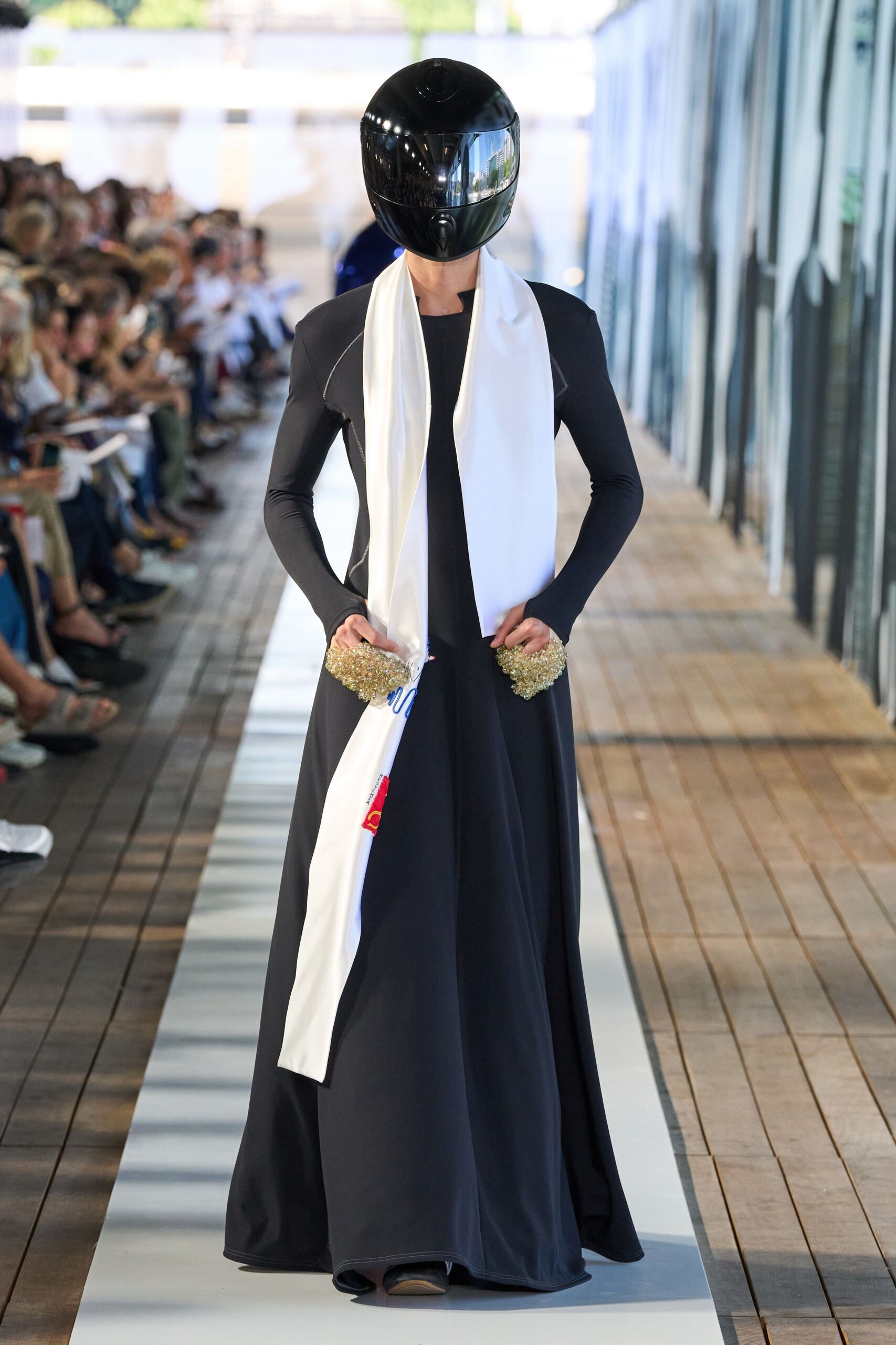 black silk long-sleeve gown with white scarf