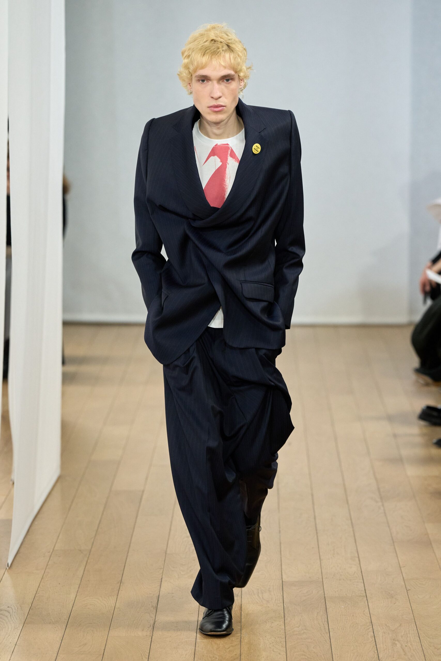 navy suit with white shirt and red tie