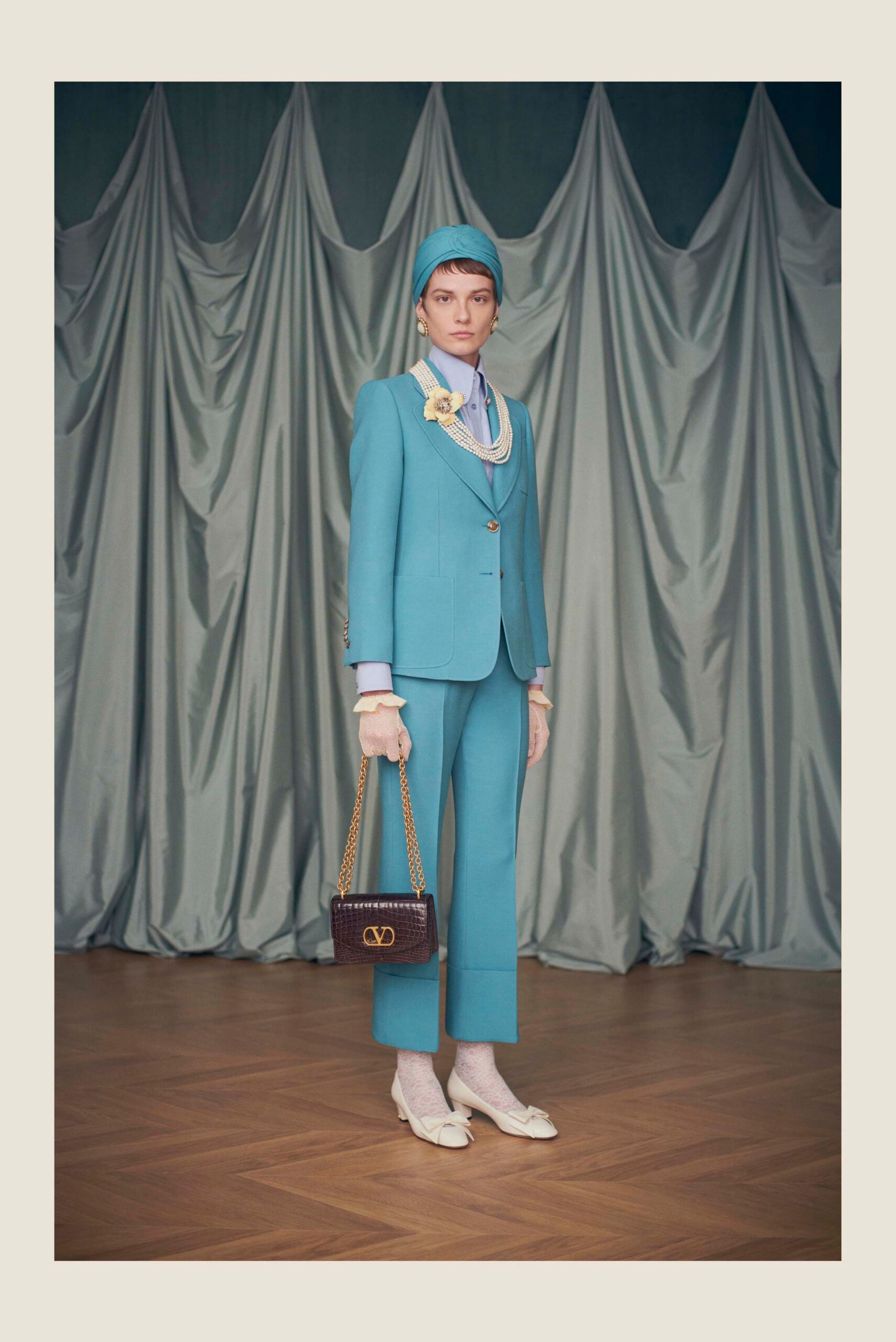 blue tailored suit with accessories