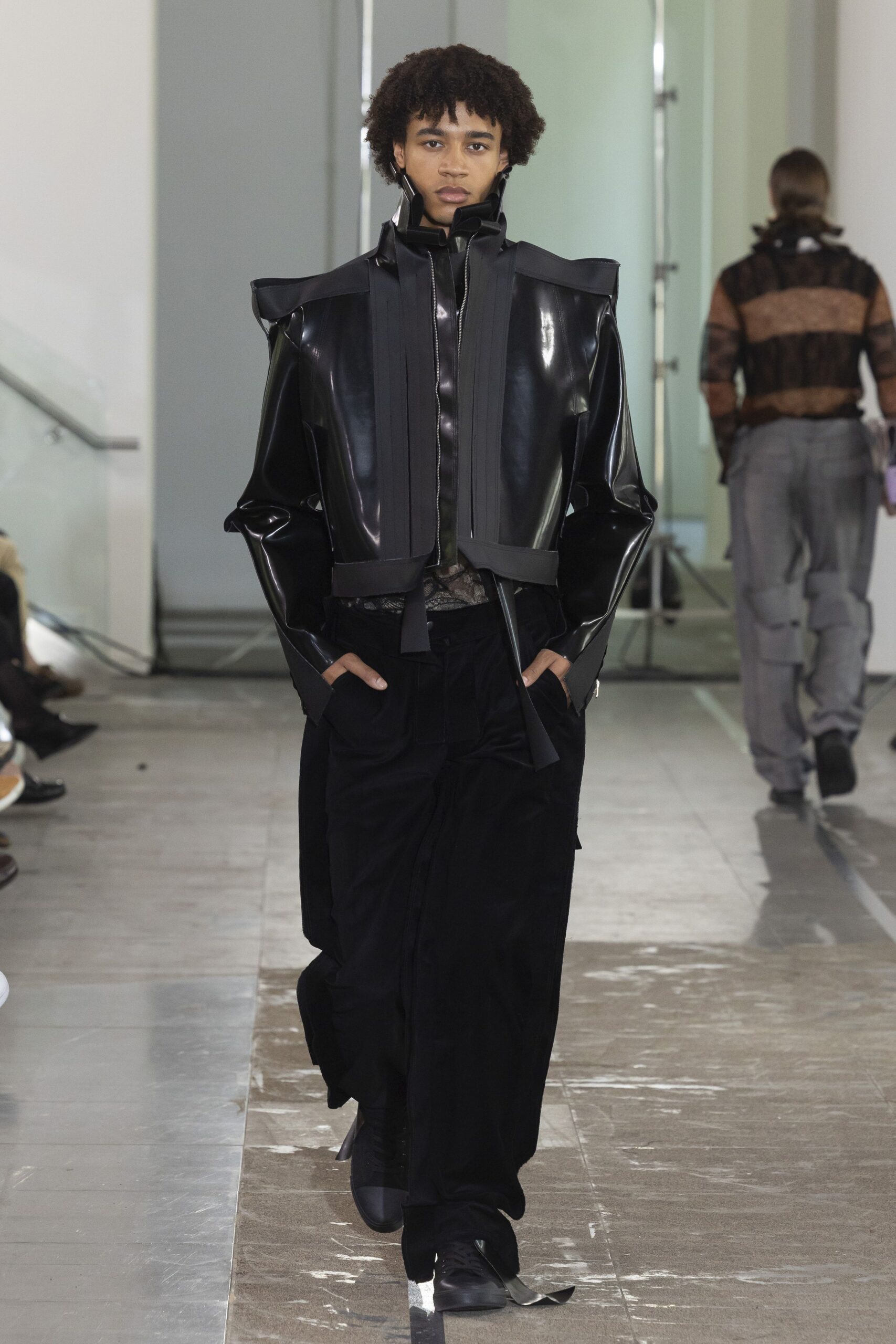 black leather structured jacket and relaxed pants