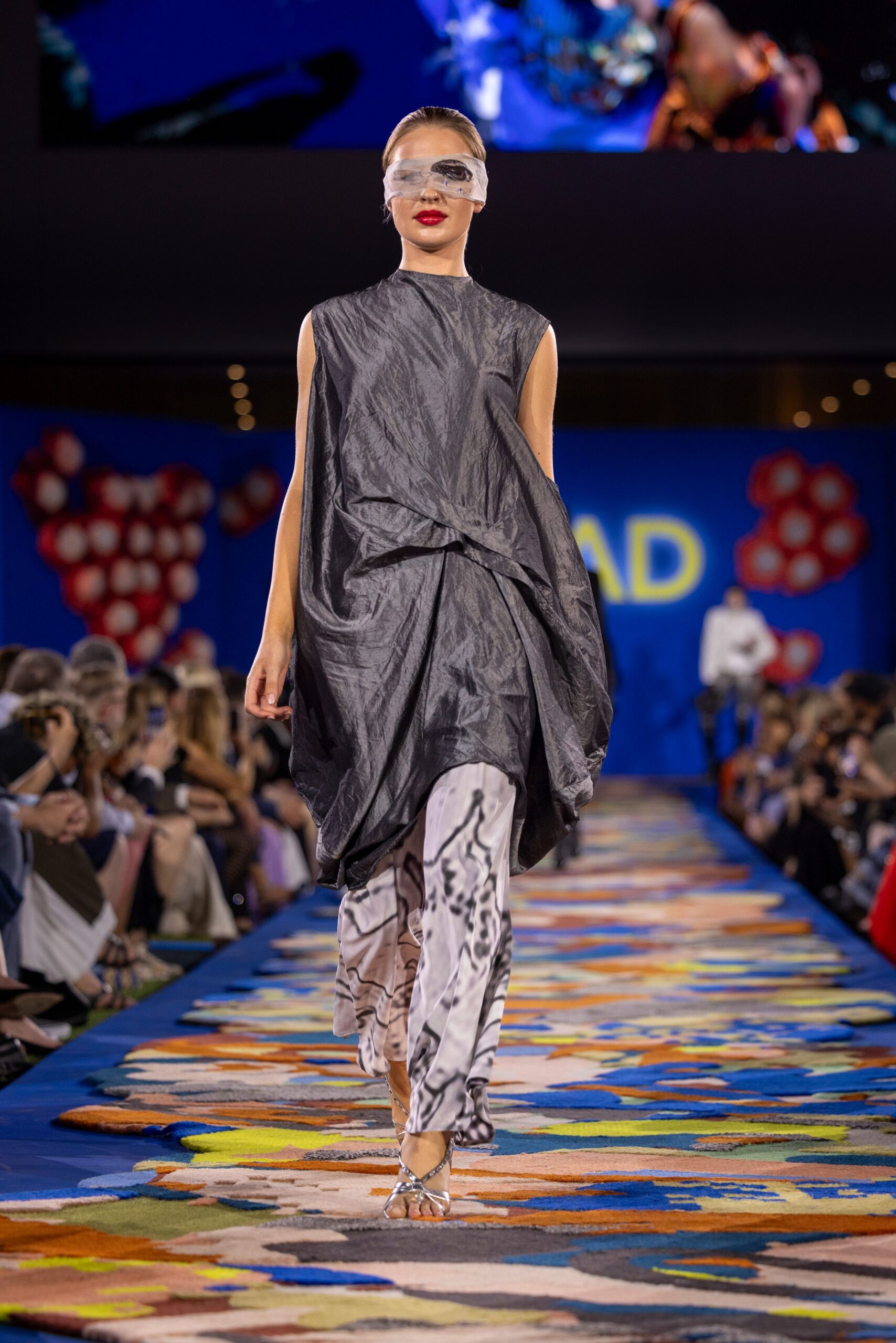 gray draped midi dress with printed pants