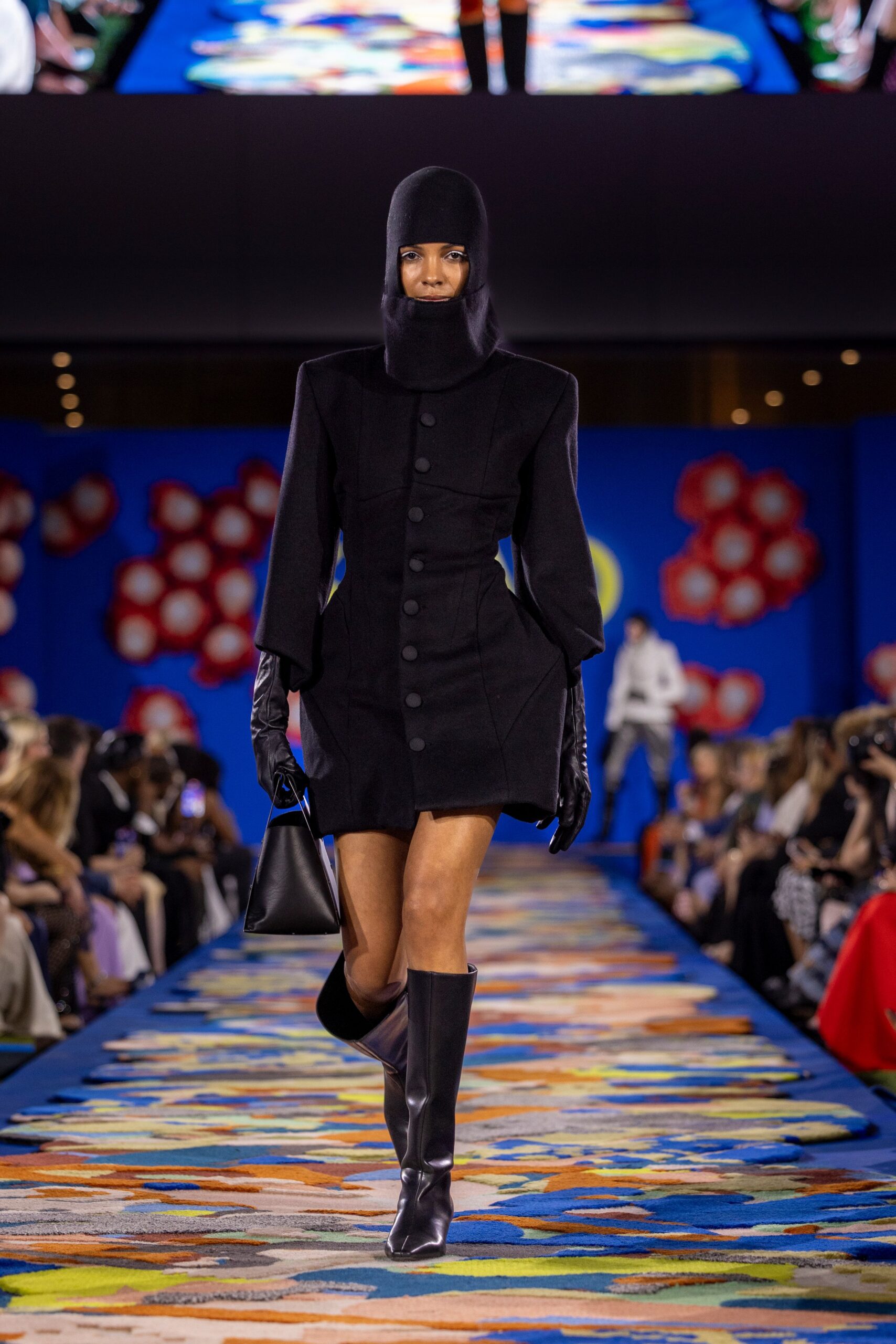 black fitted coat with gloves and boots