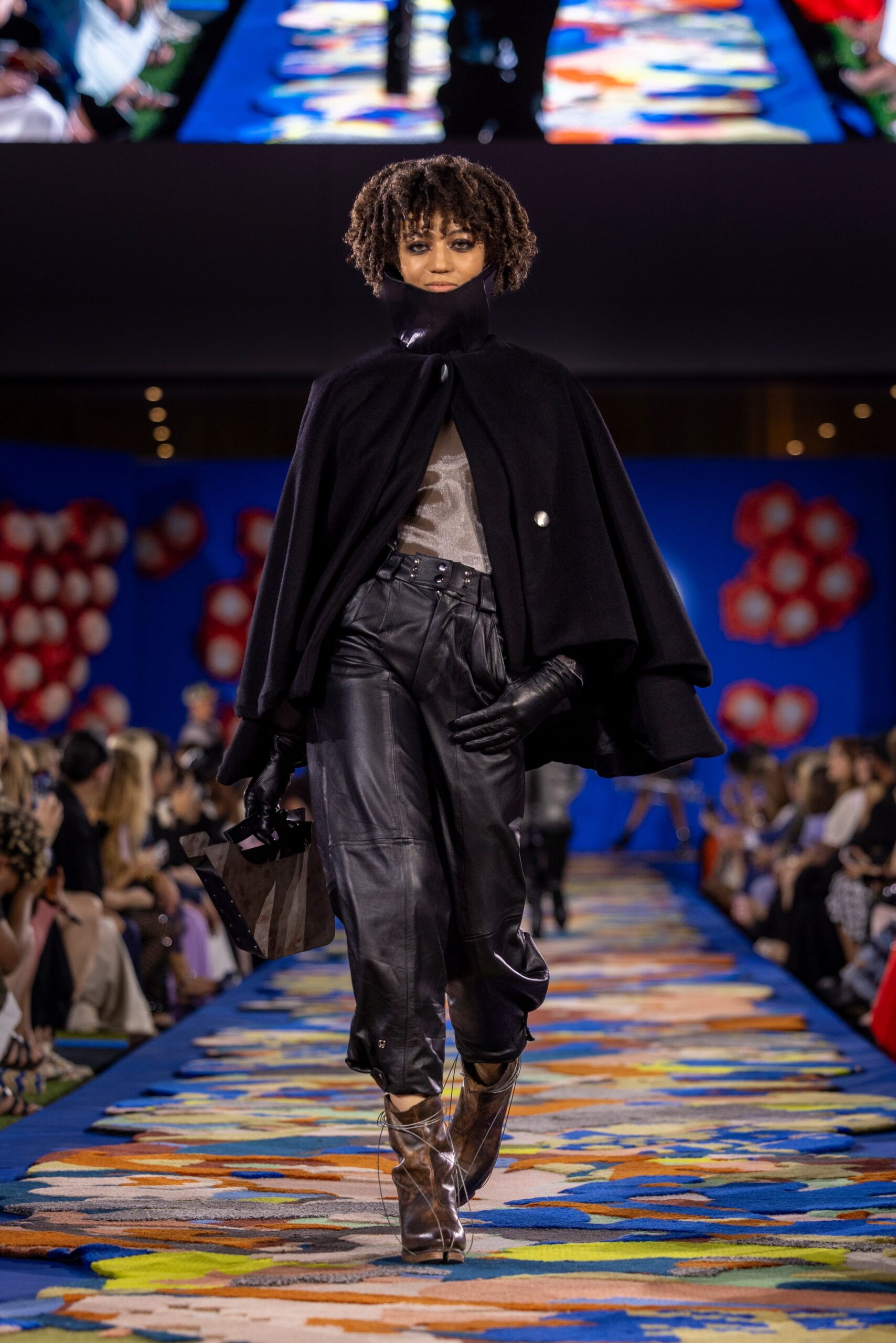 black wool cape with leather pants