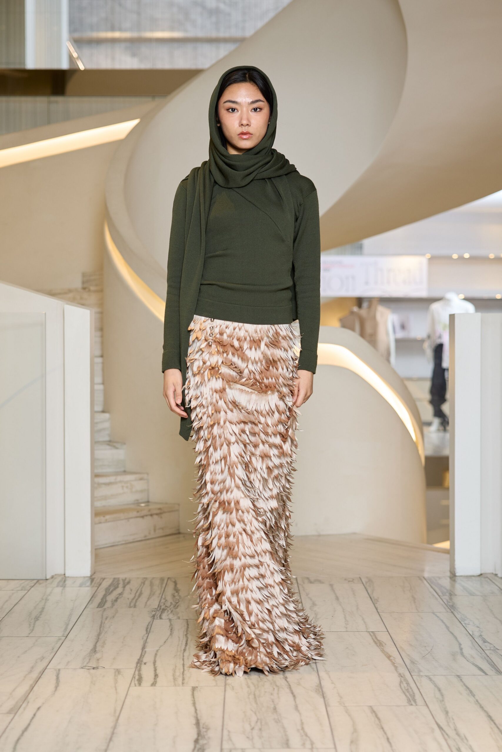 green fitted top beige fringed skirt