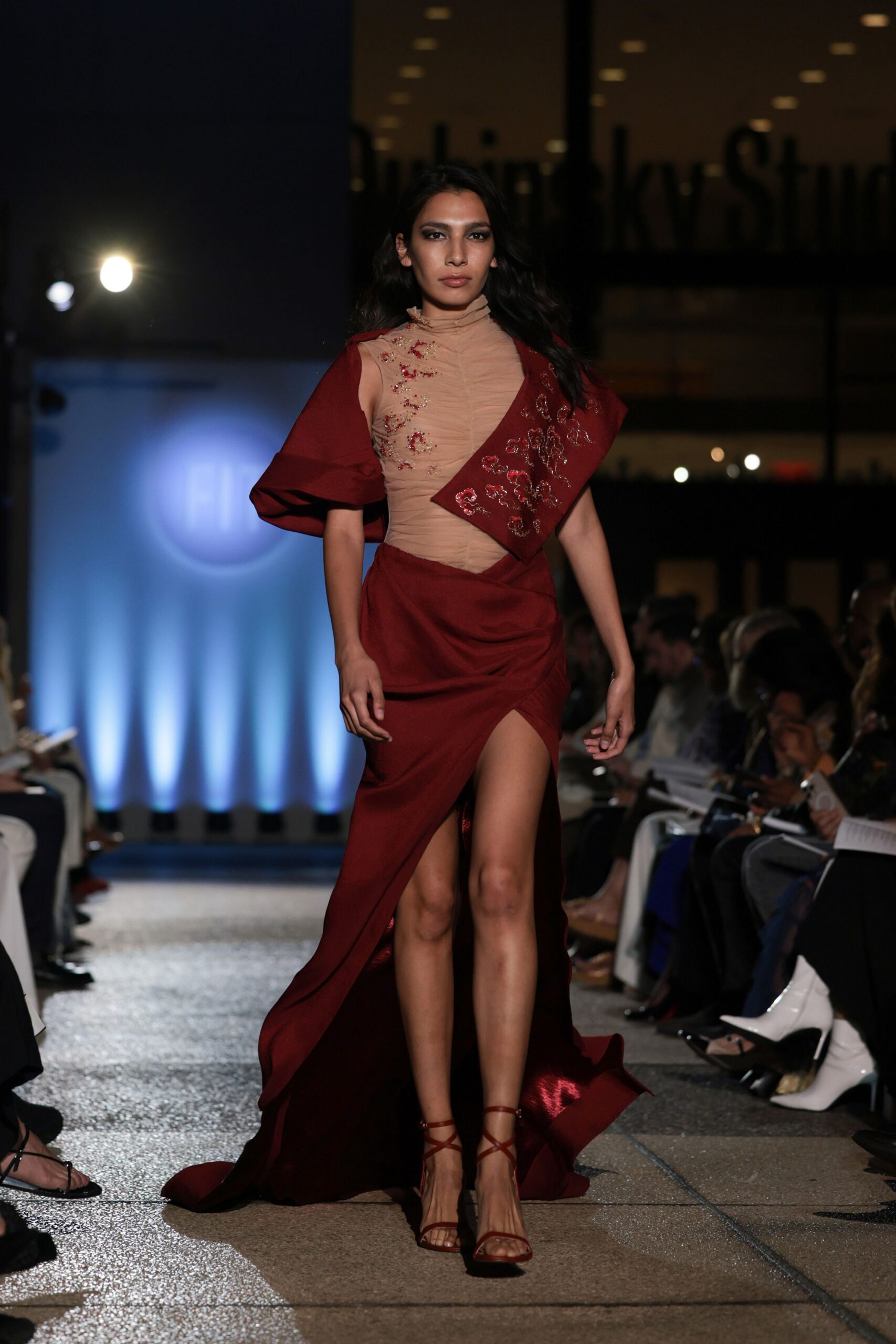 red silk sleeveless v-neck fitted draped embroidered gown