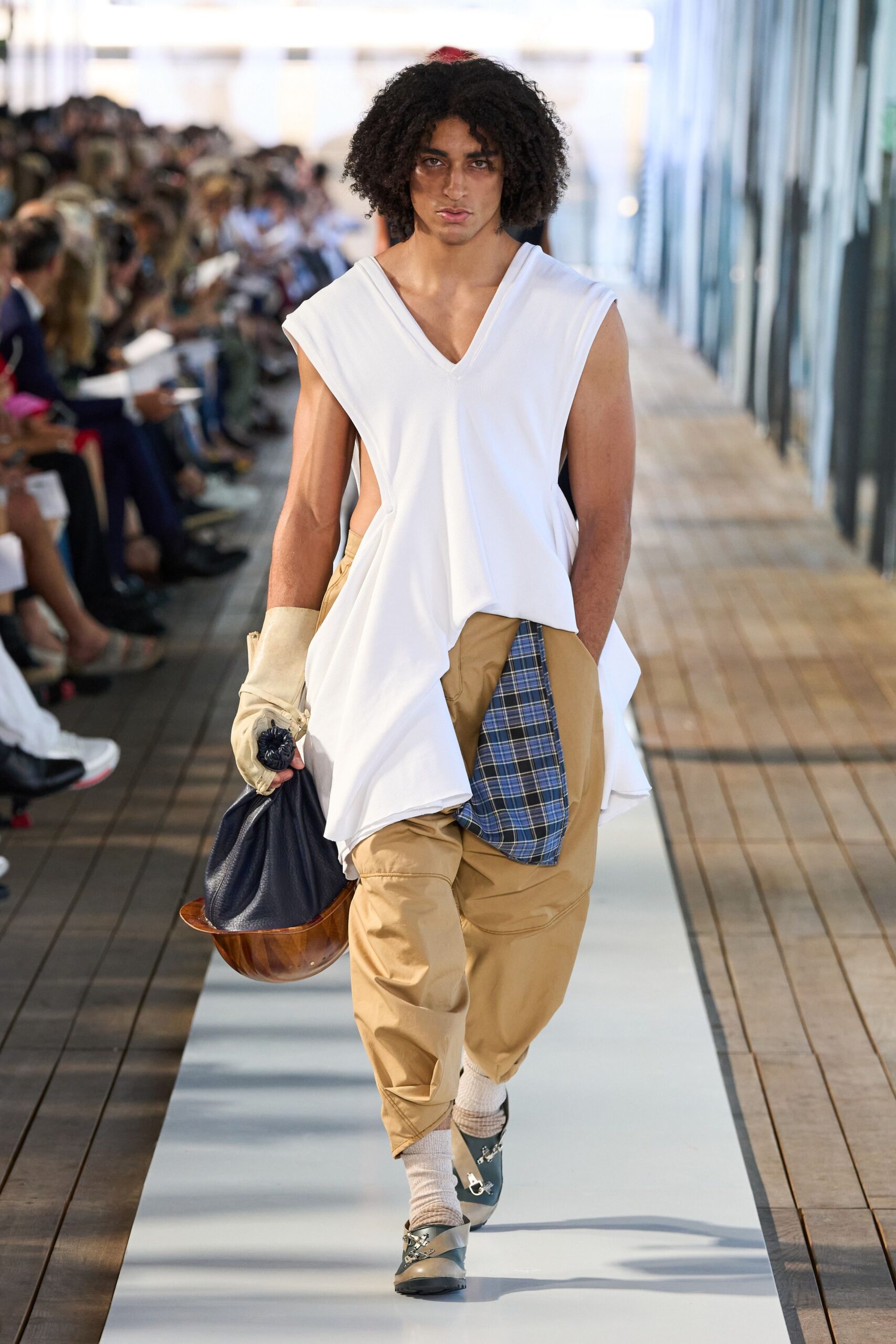white relaxed top with beige pants