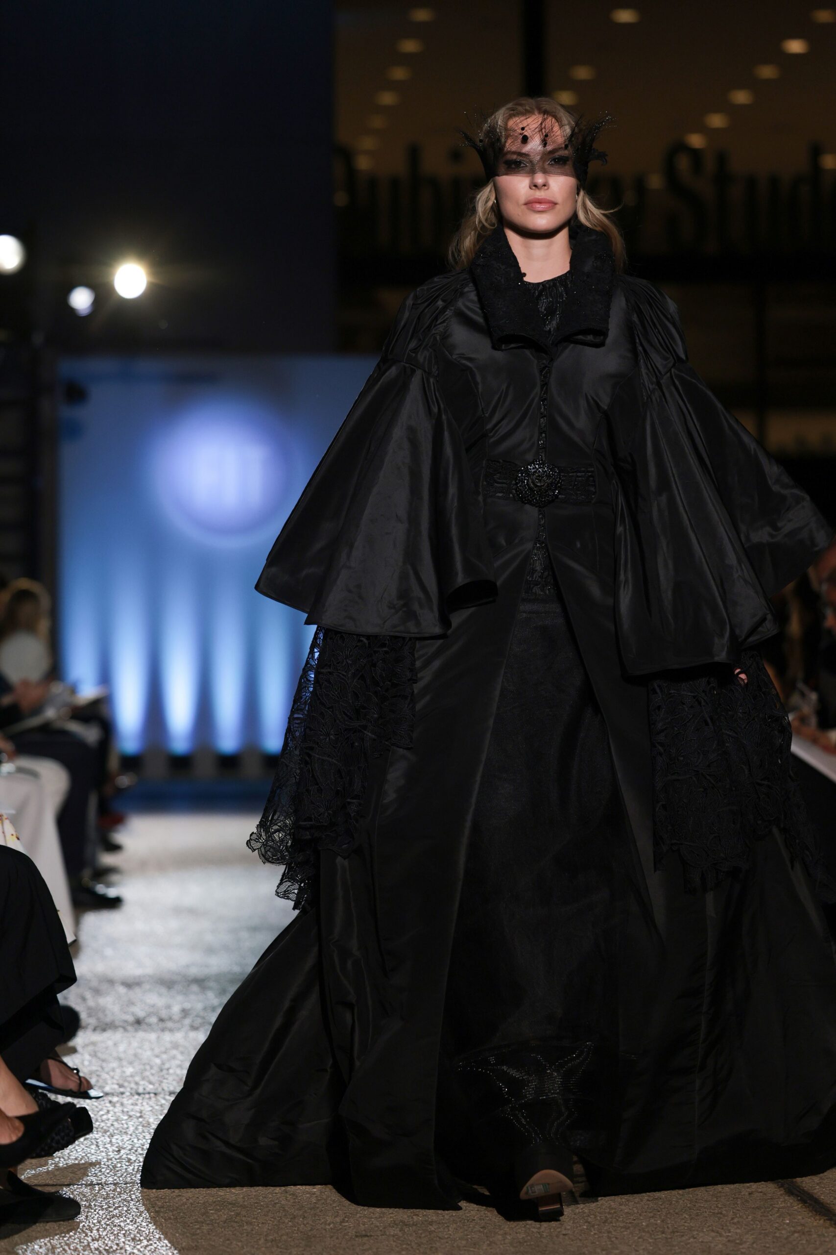 black silk gown with cape