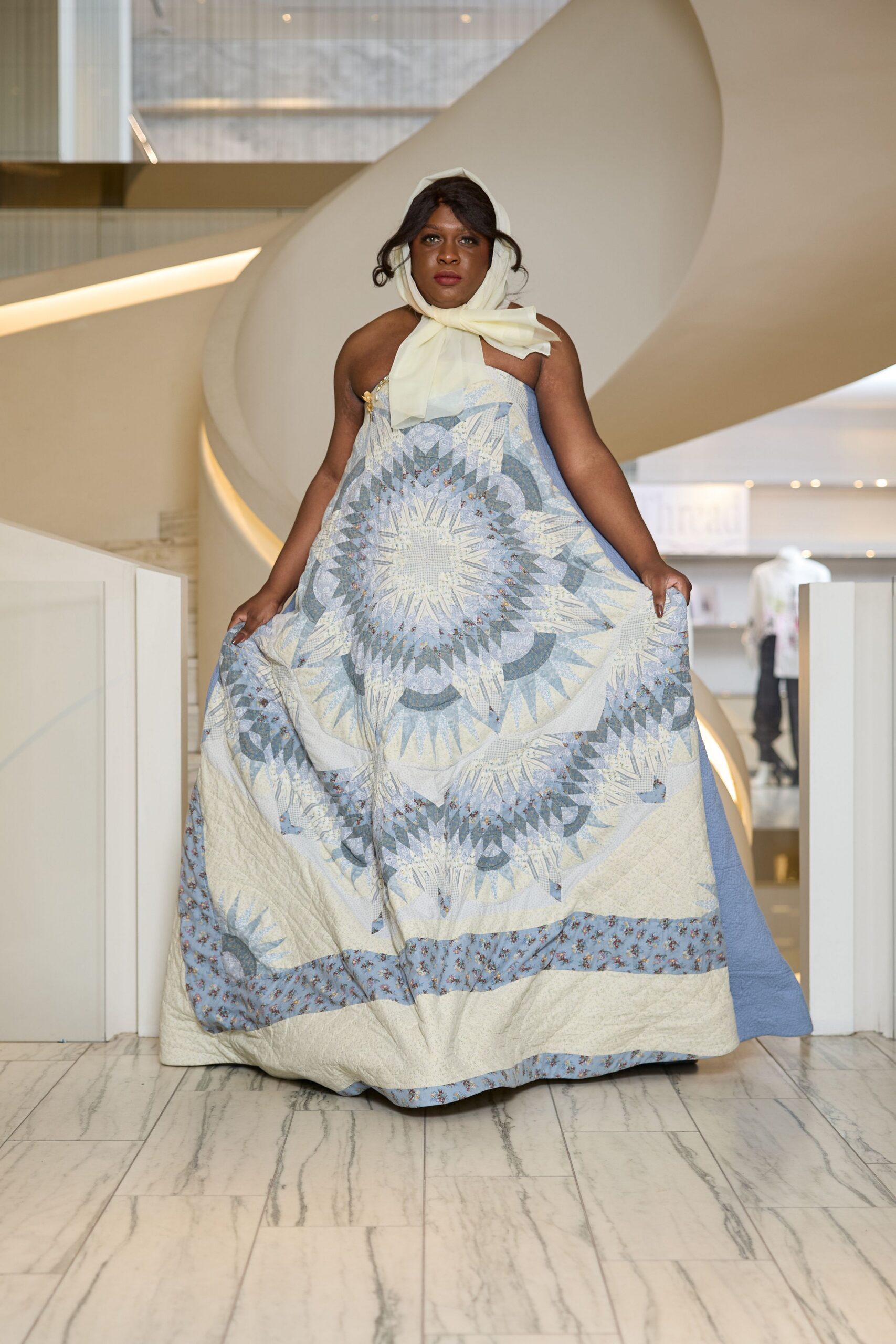 blue and white embroidered gown