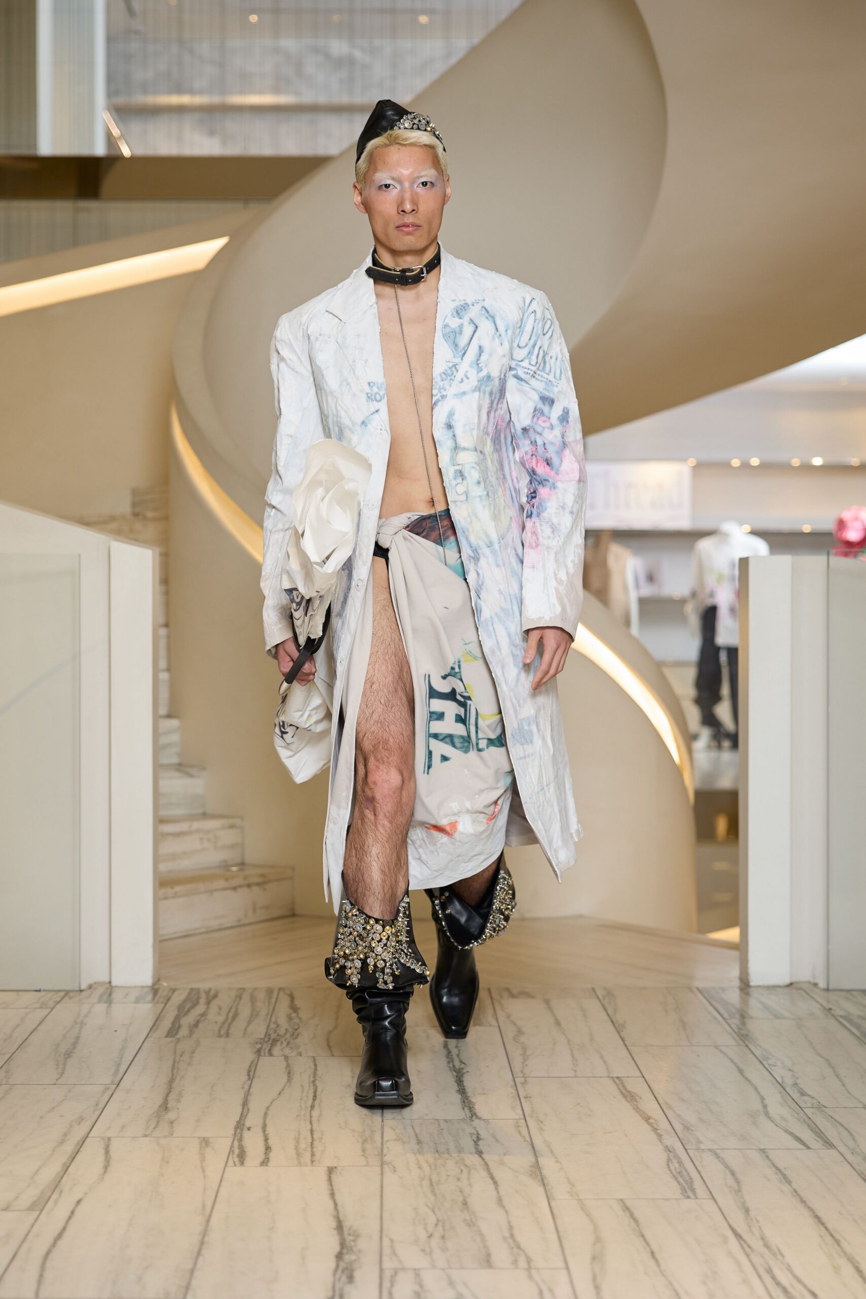 white printed coat with beige skirt