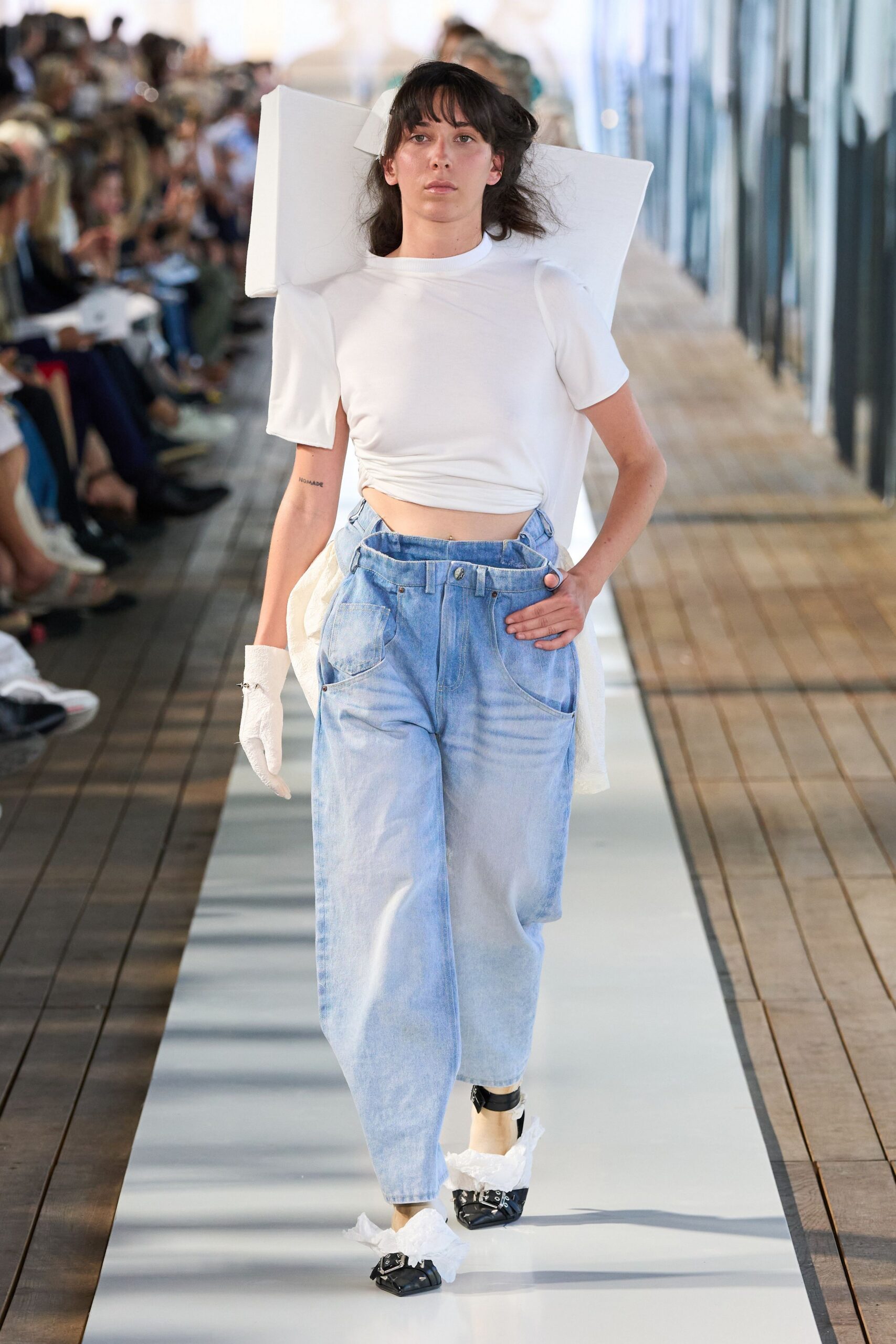 white cropped top blue relaxed pants
