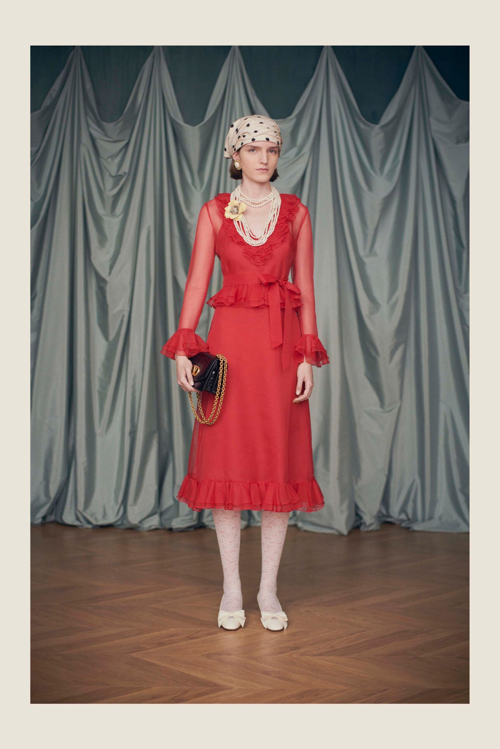 red silk long-sleeve v-neck fitted ruffled belted dress