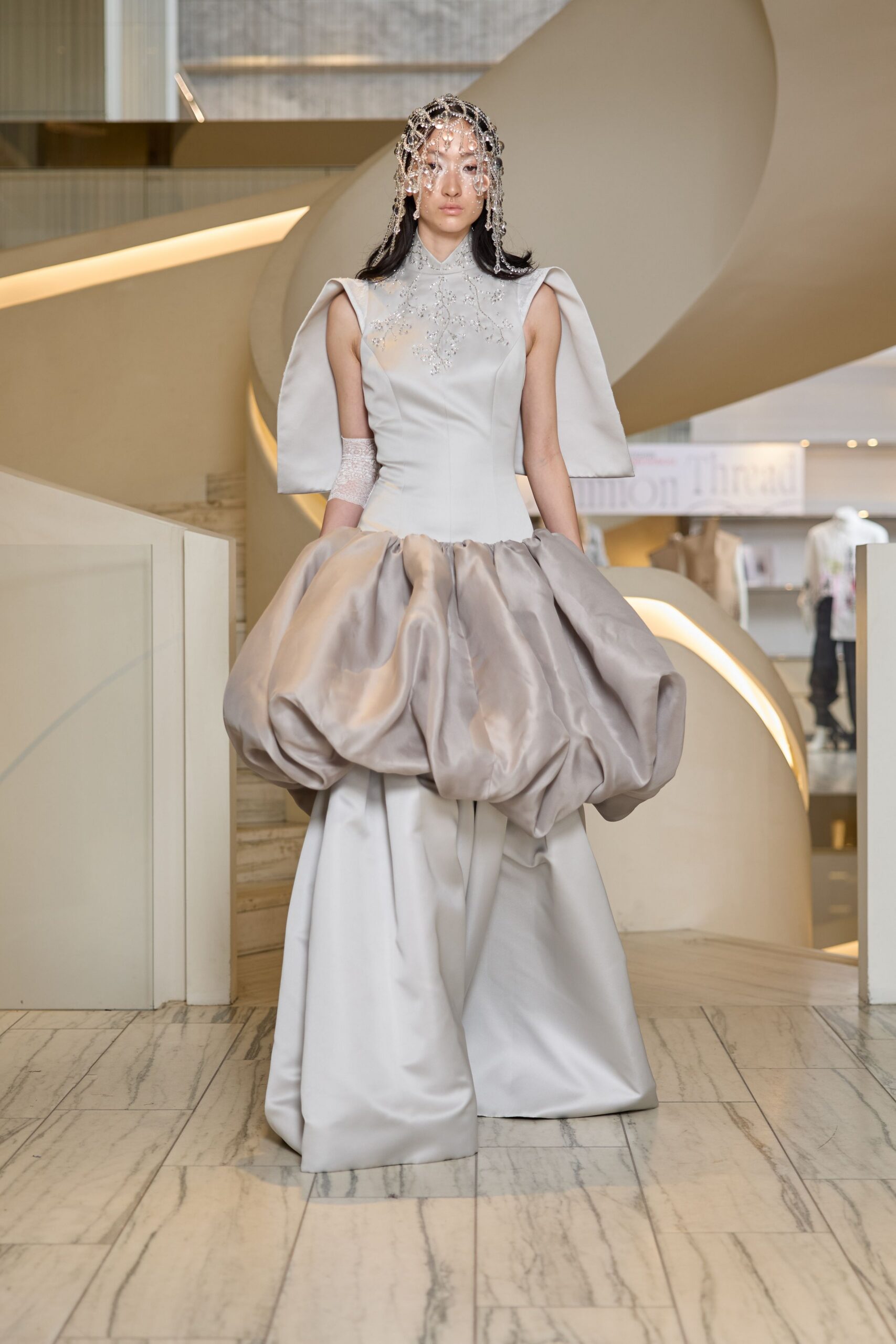 white silk pleated gown