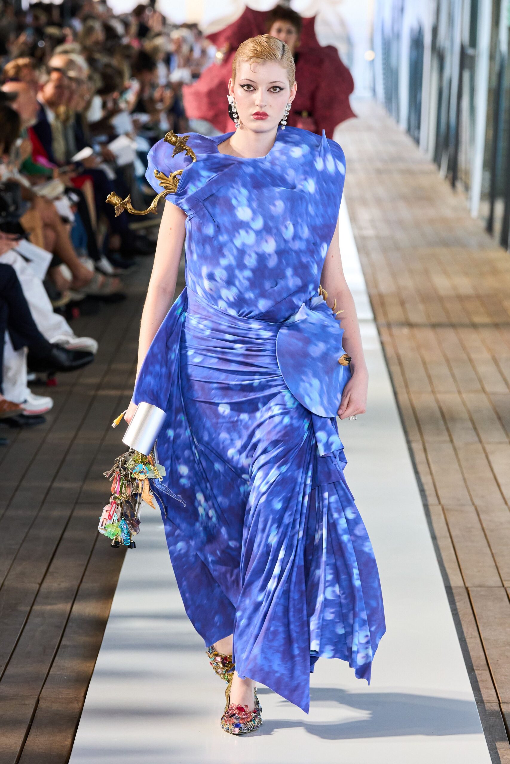 blue silk sleeveless v-neck fitted draped flared gown