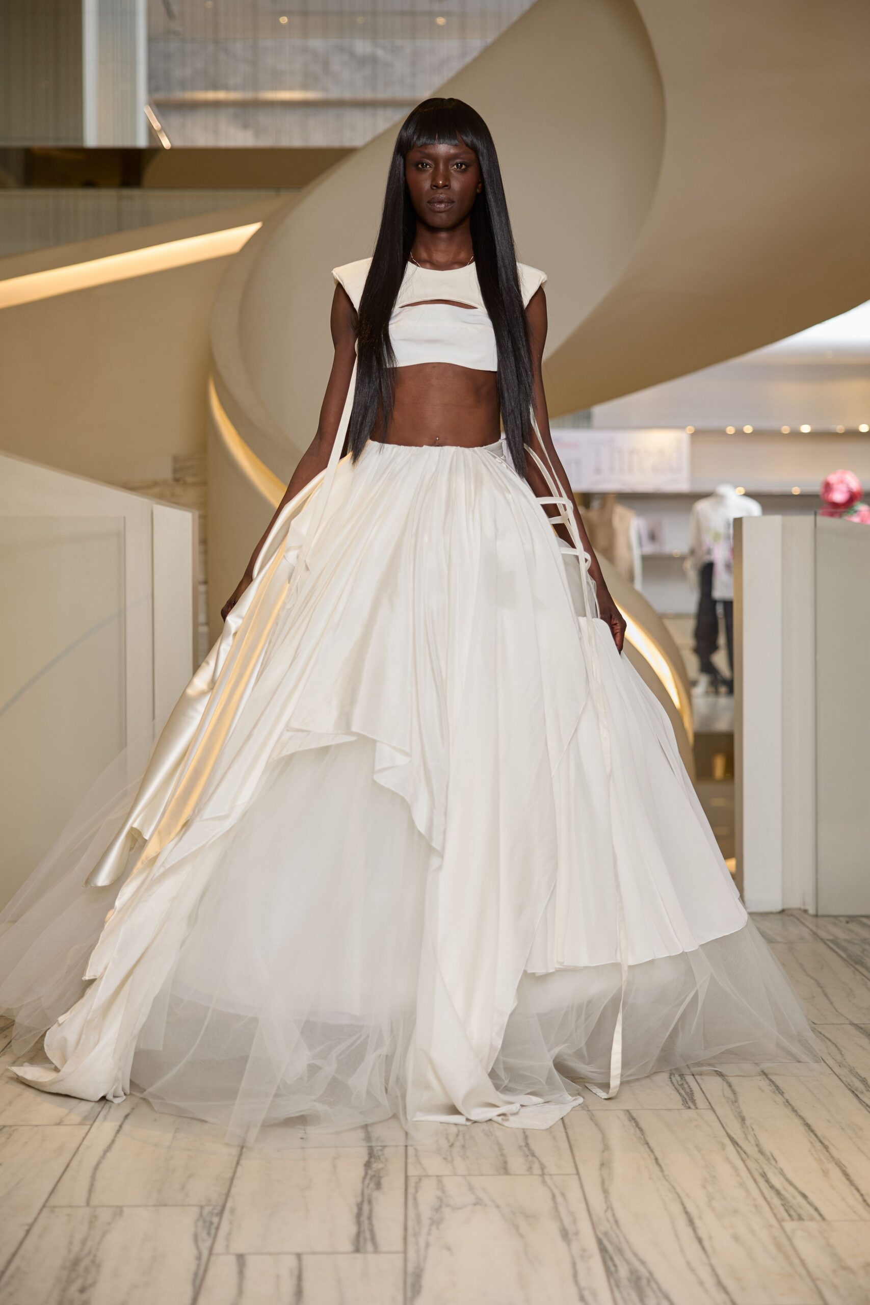 white silk long-sleeve asymmetric fitted layered flowing gown