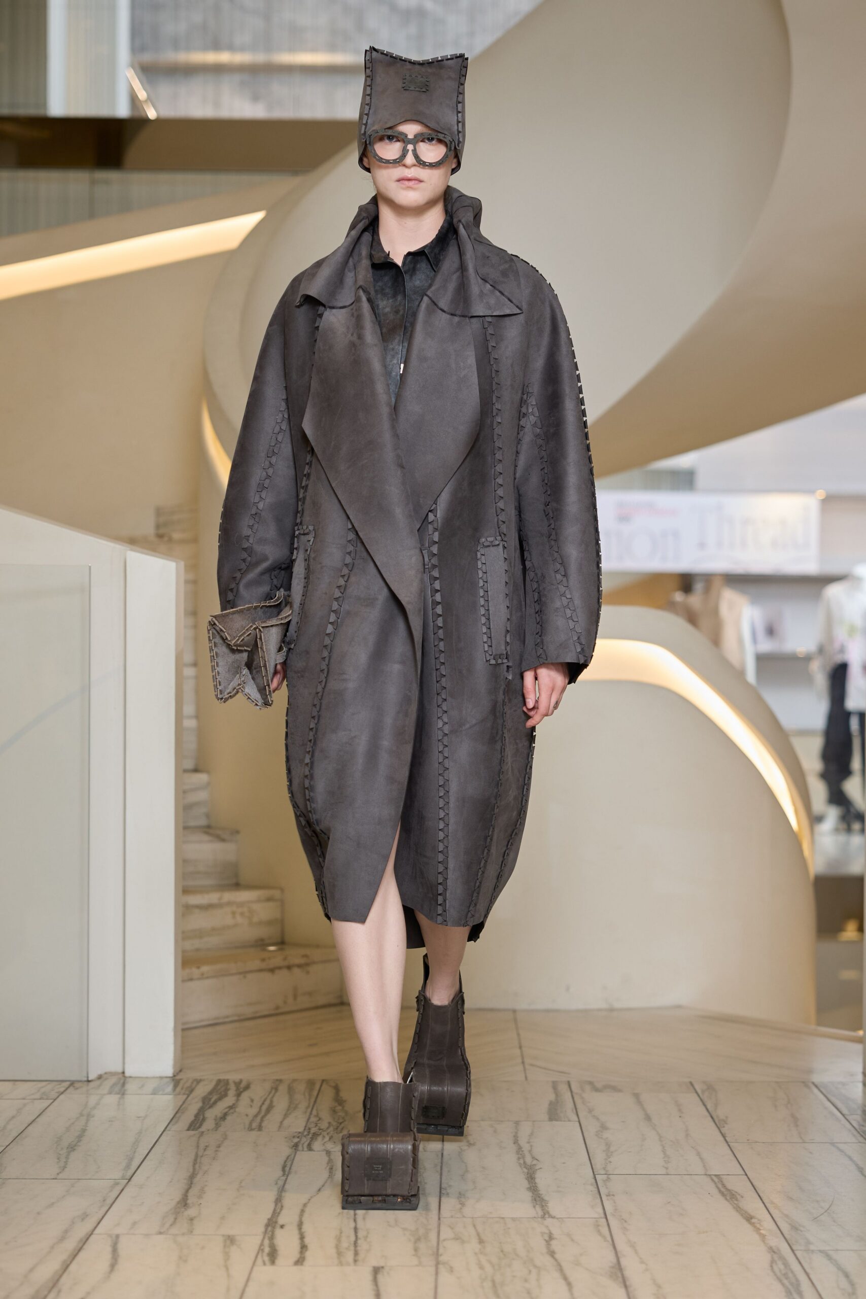 gray leather long-sleeve collared relaxed zippered pockets coat