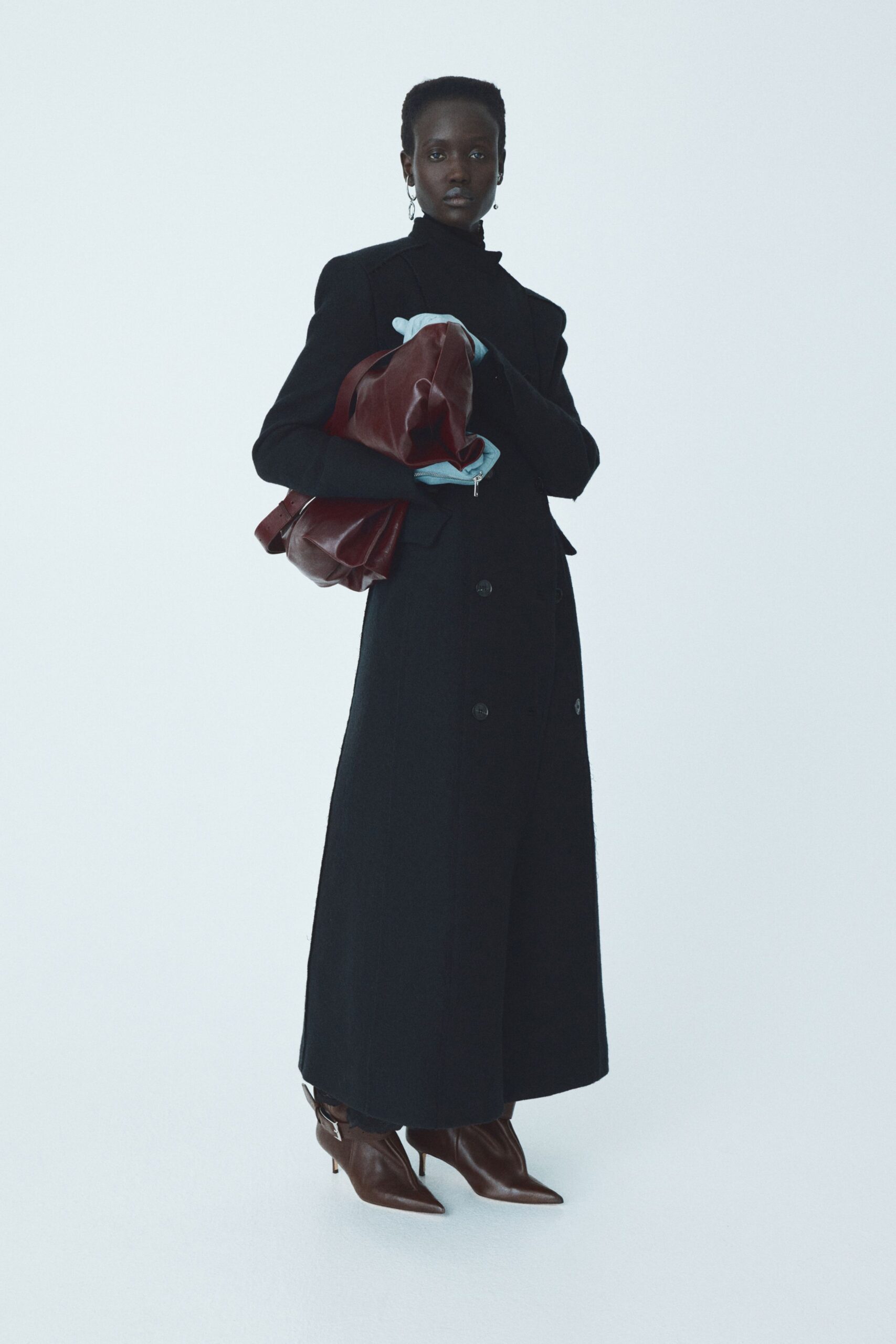 black wool long-sleeve collared fitted buttoned maxi coat