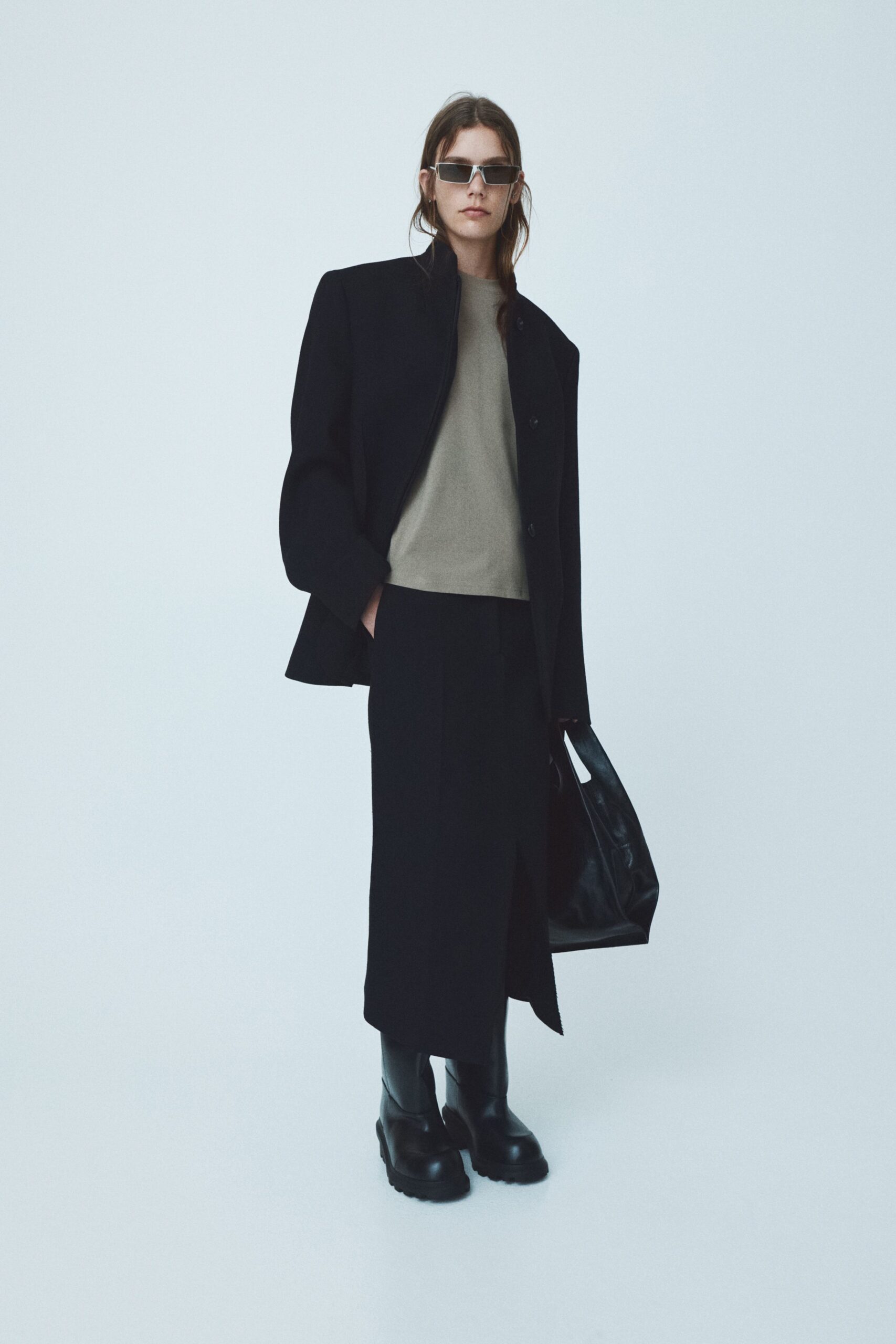 black wool long-sleeve collared relaxed coat