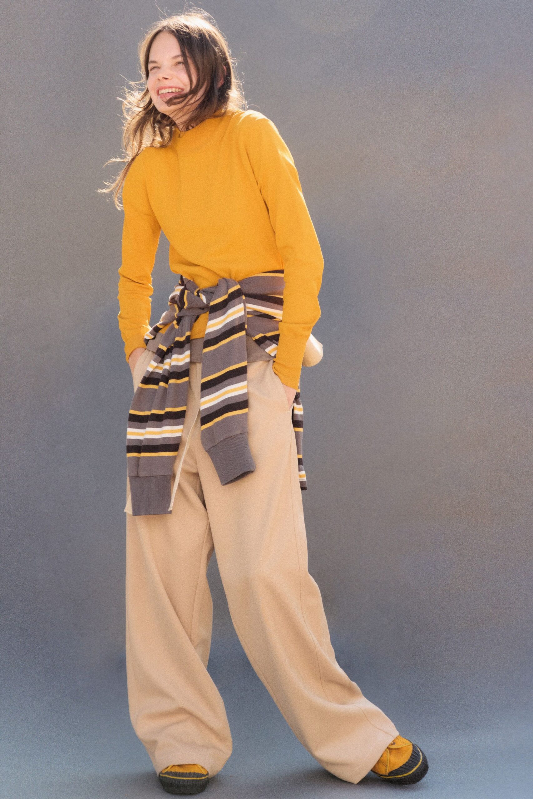 yellow fitted top beige relaxed pants
