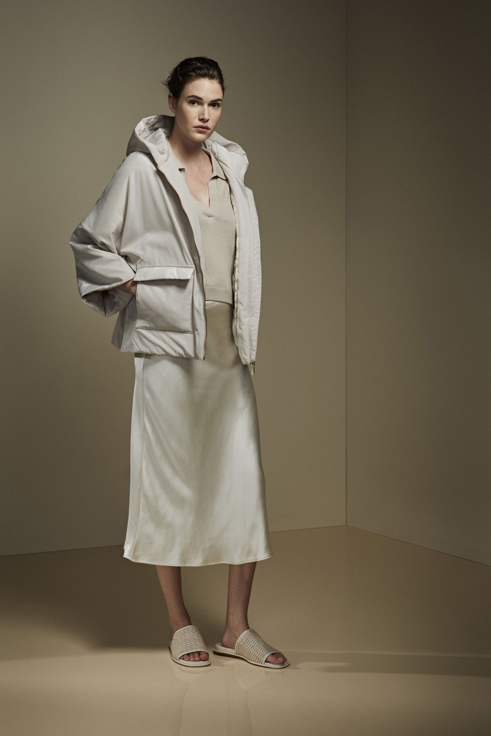 beige relaxed jacket with silk top and midi skirt