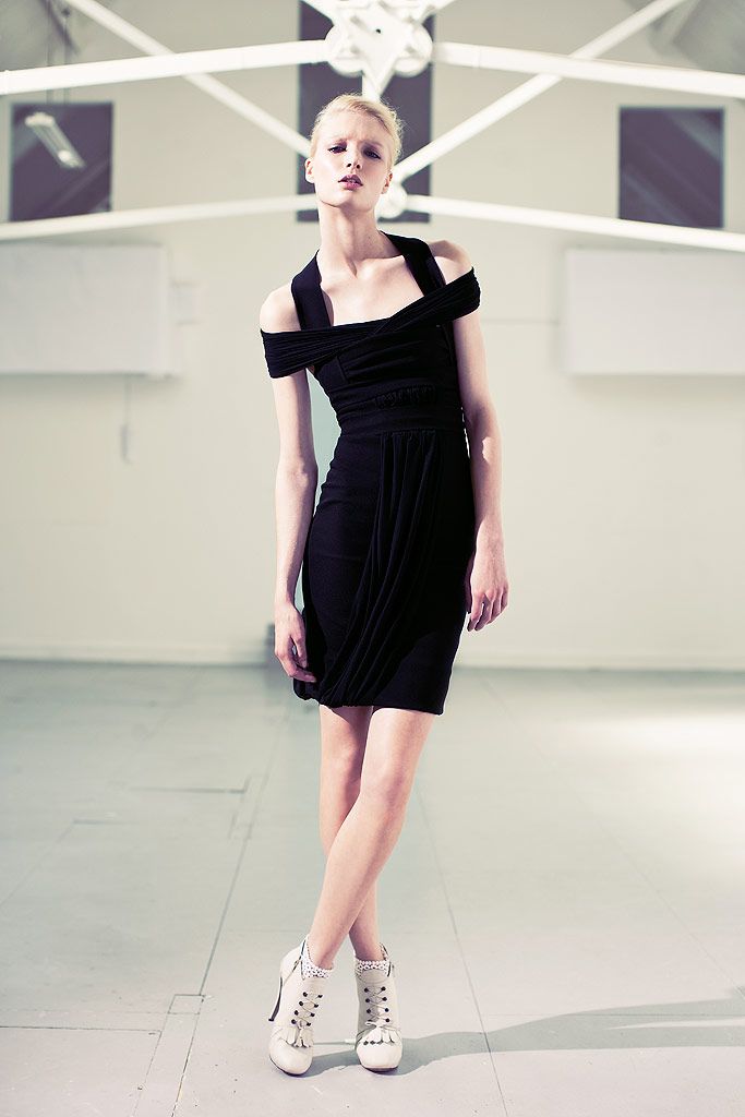 black jersey off-shoulder sleeveless fitted draped ruched mini-dress