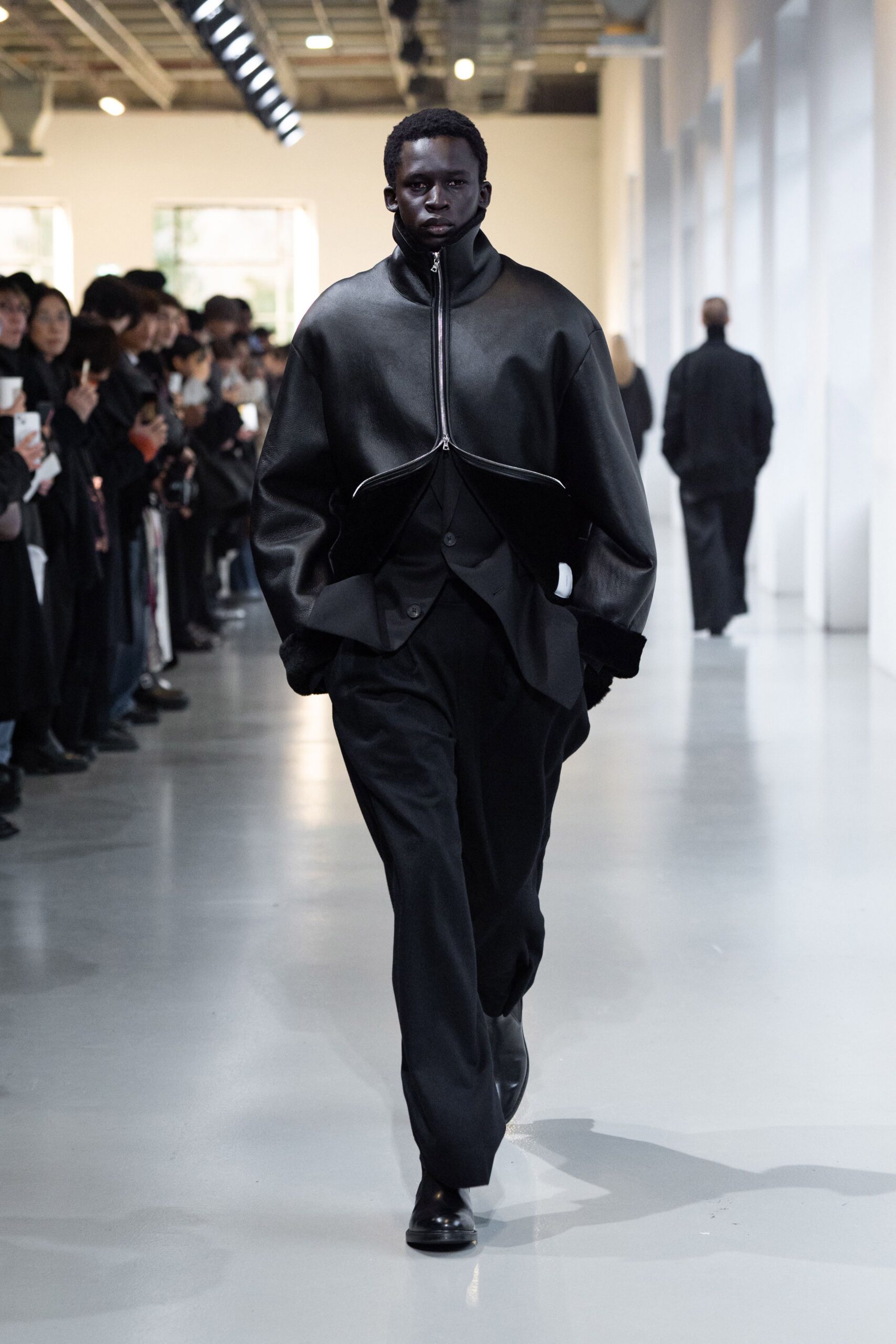 black leather long-sleeve collared oversized zippered jacket