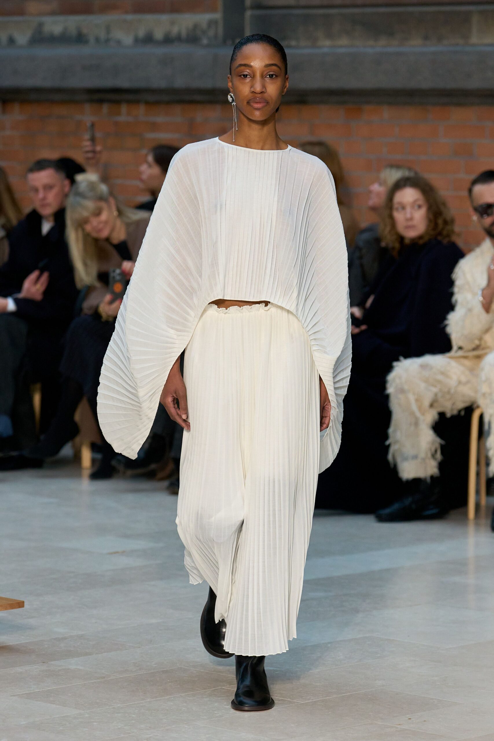 white pleated top and pants
