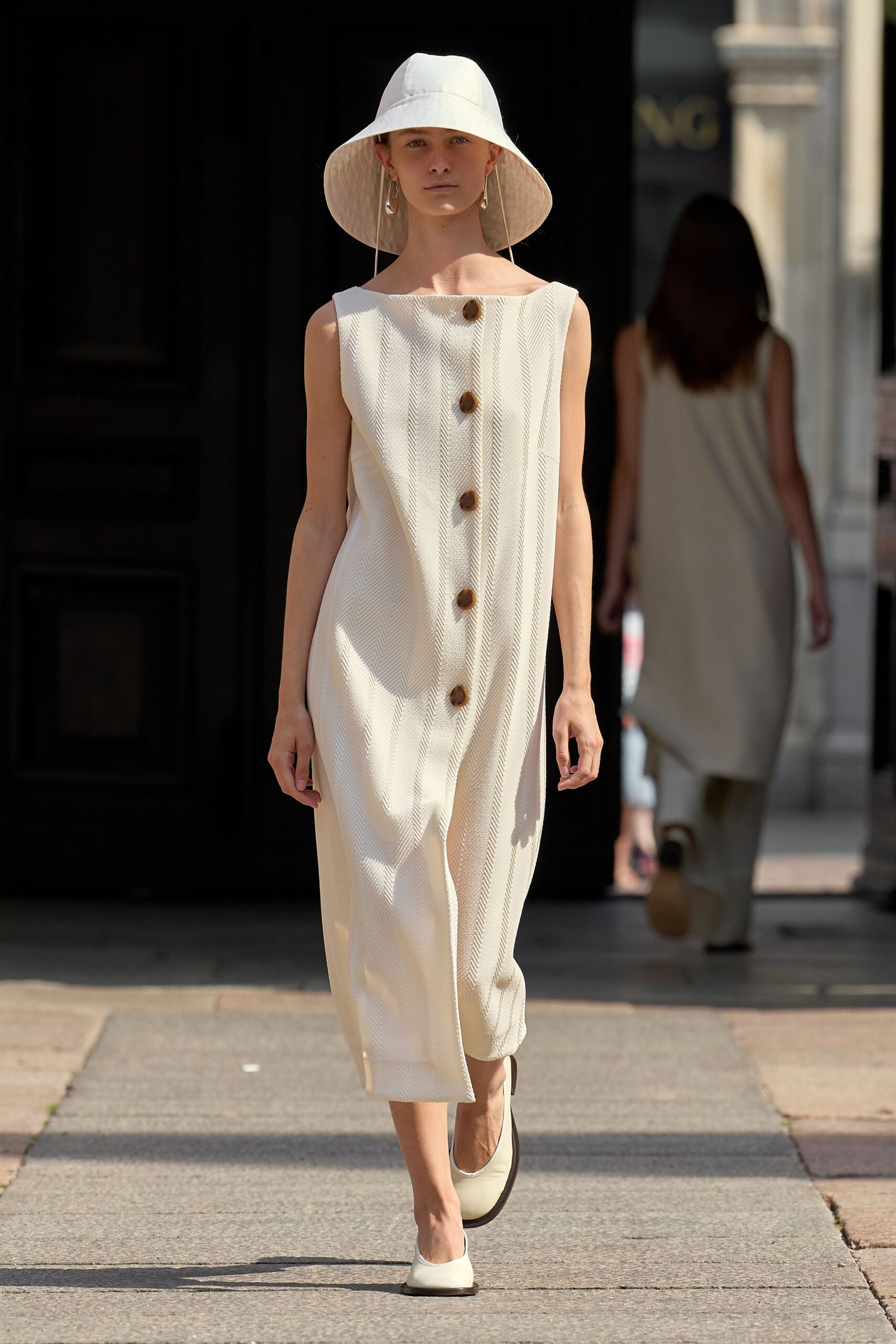 white cotton sleeveless v-neck relaxed buttoned midi dress