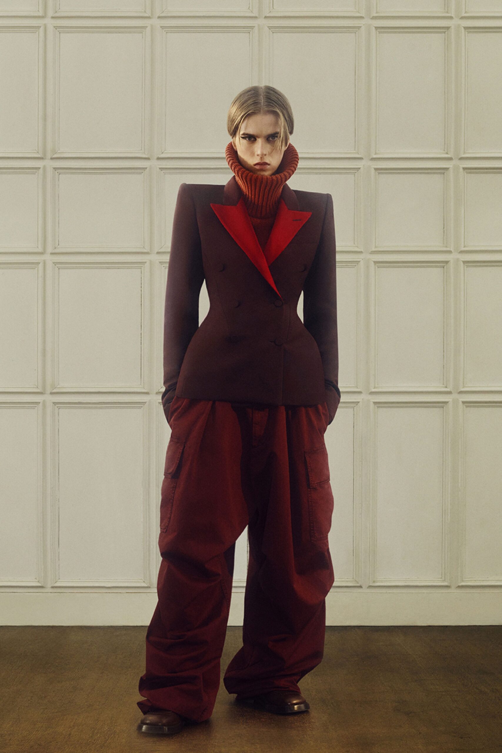 black and red structured blazer with relaxed pants