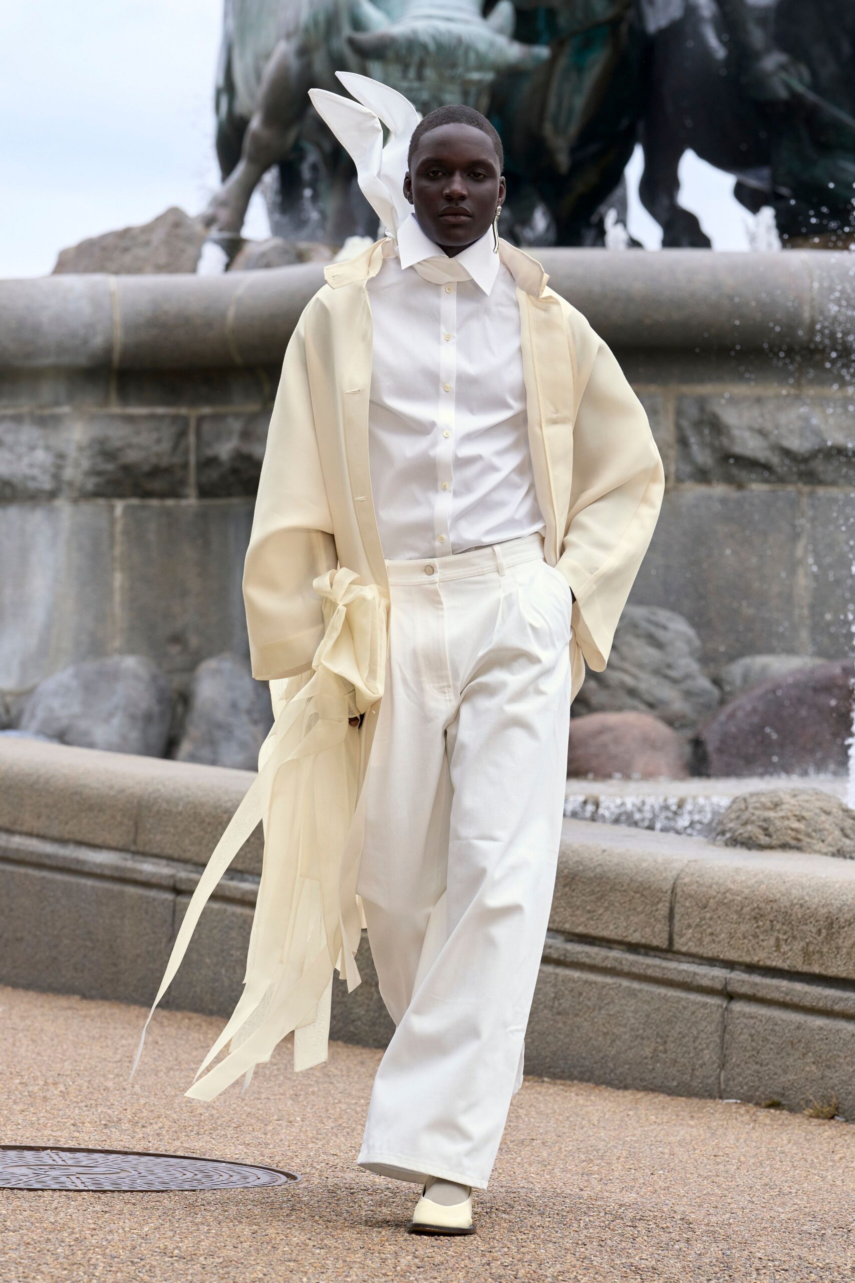 cream coat white shirt pants