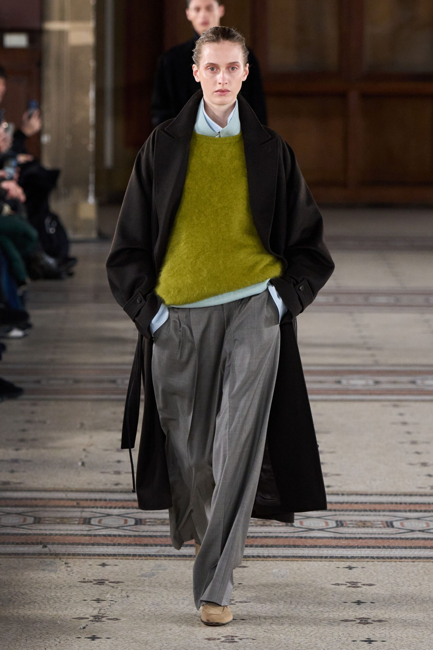 black wool coat green sweater