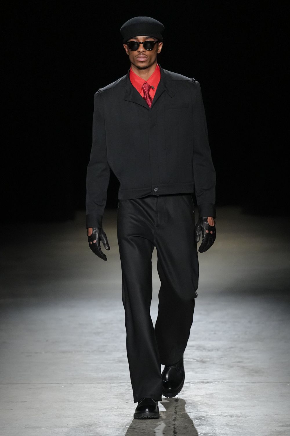 black fitted jacket red shirt