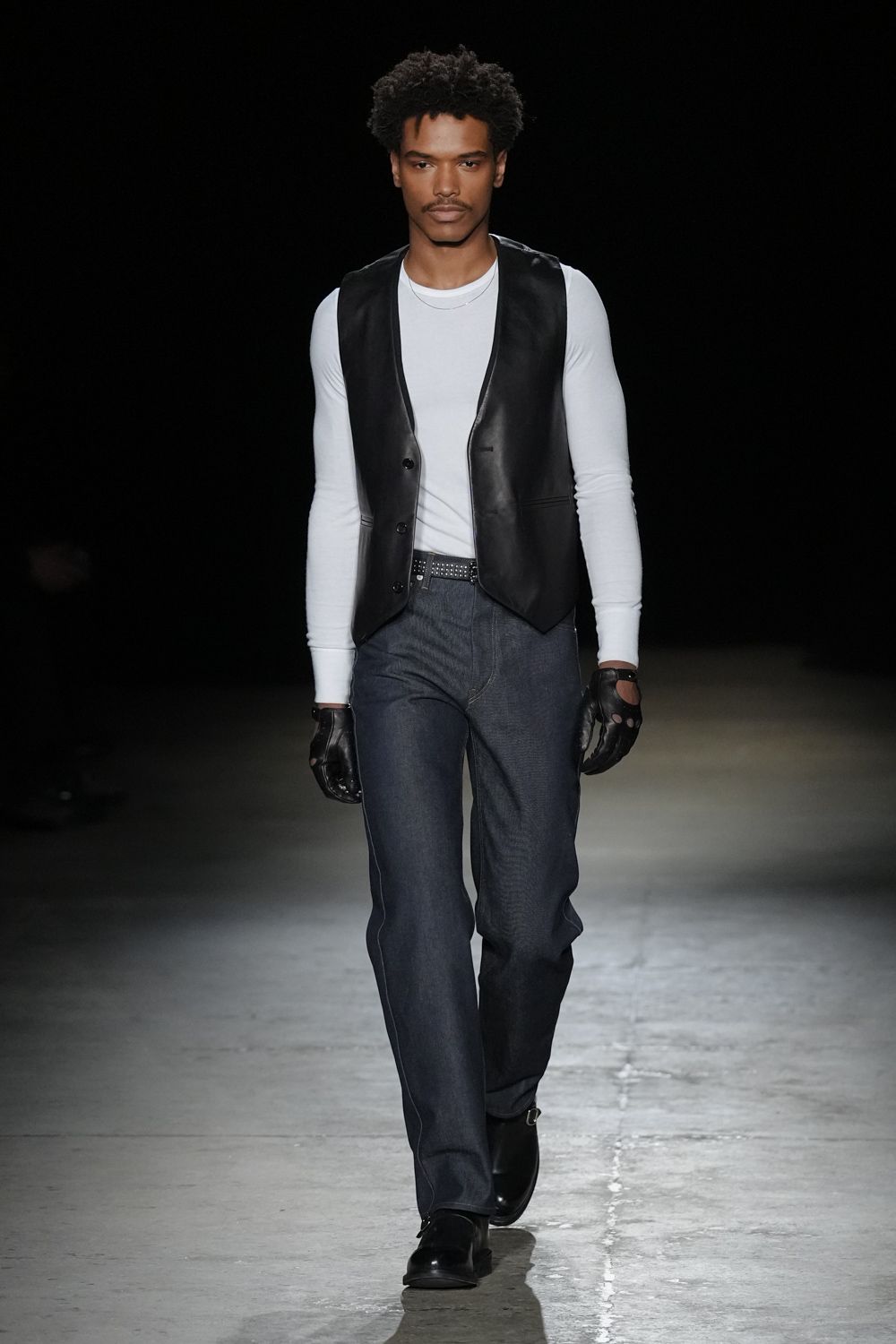 black leather vest with white shirt