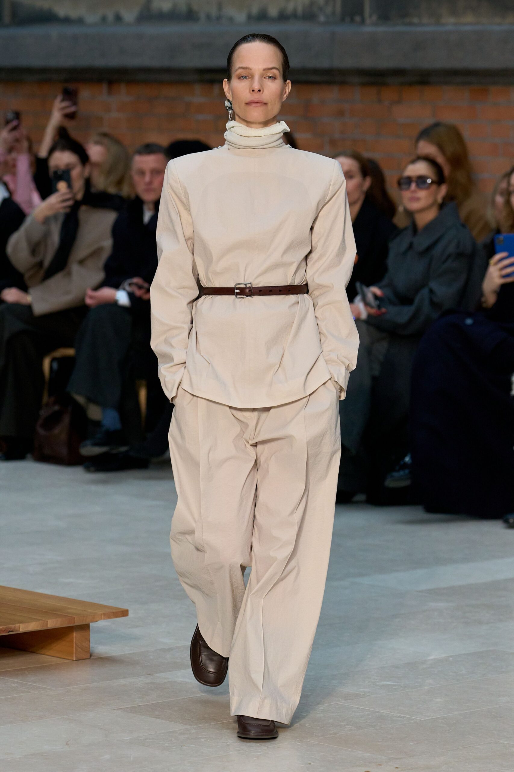 beige cotton long-sleeve turtleneck fitted belted top