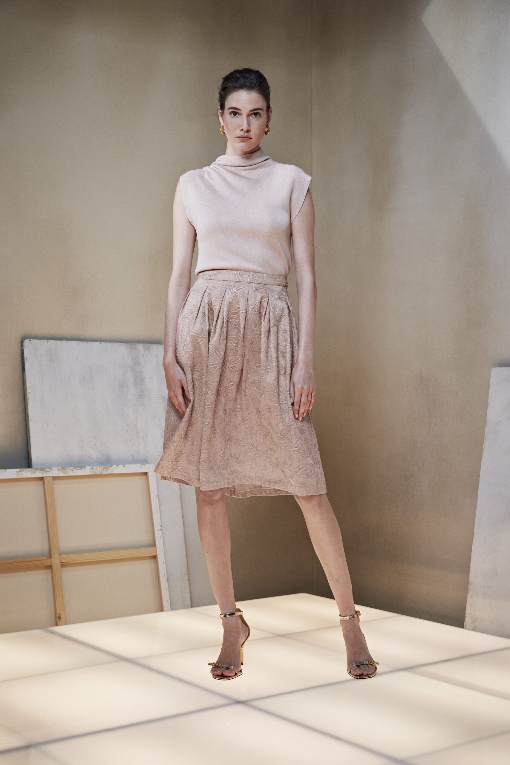 pink silk sleeveless high-neck fitted pleated top