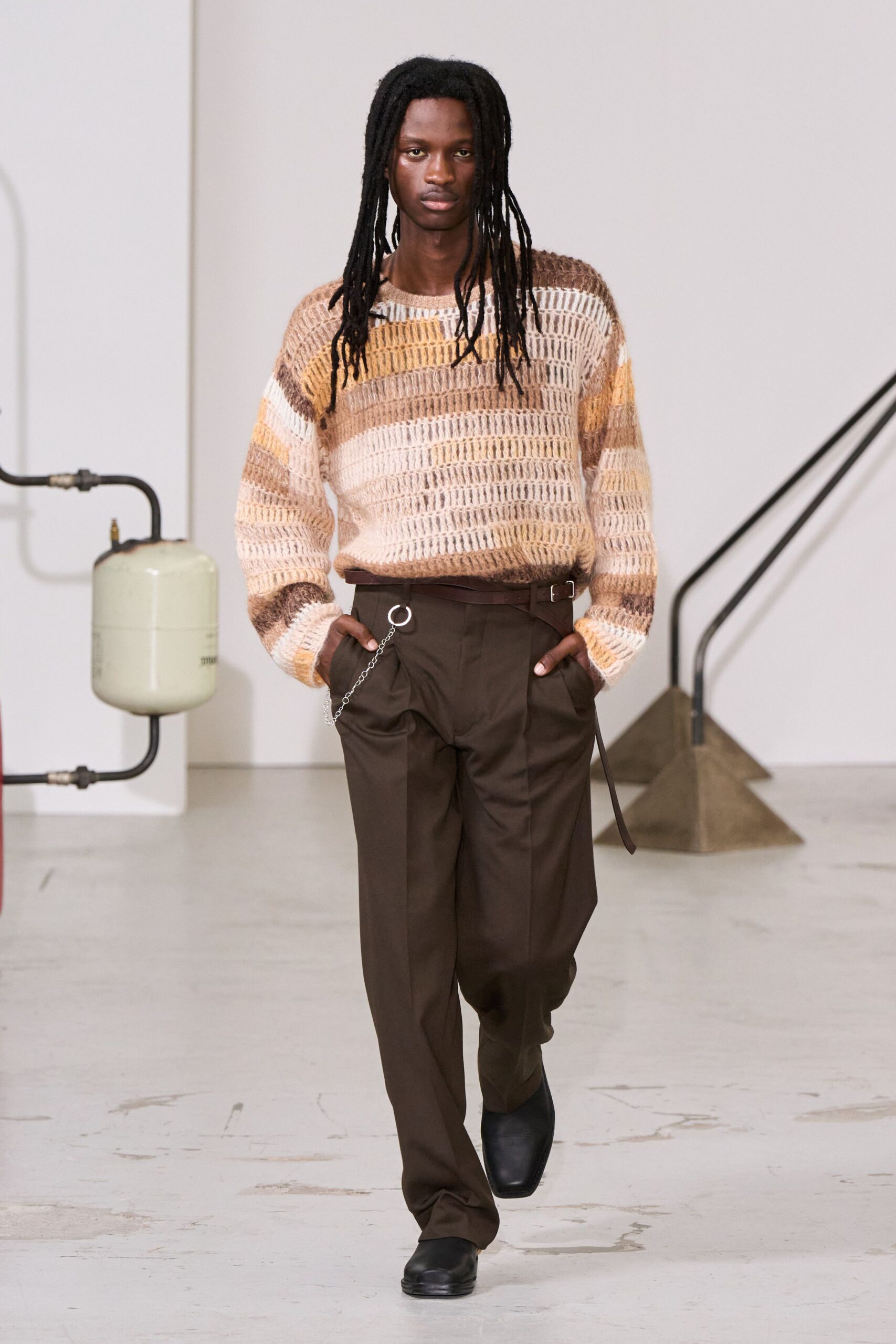 beige and brown striped sweater with tailored pants