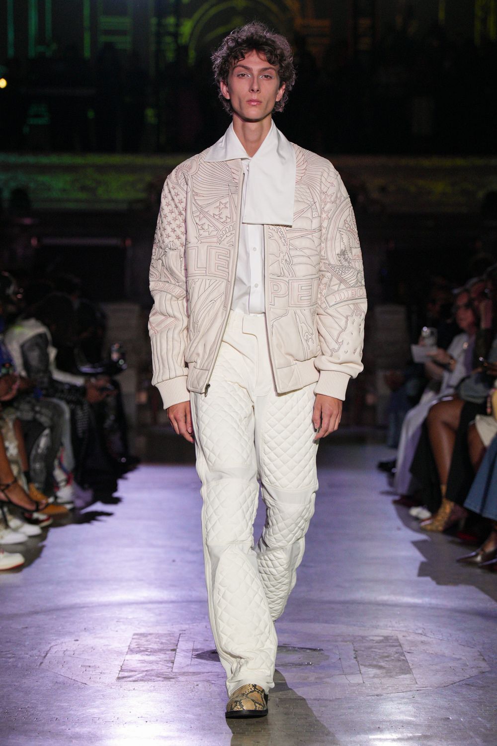 white quilted jacket with white shirt and pants