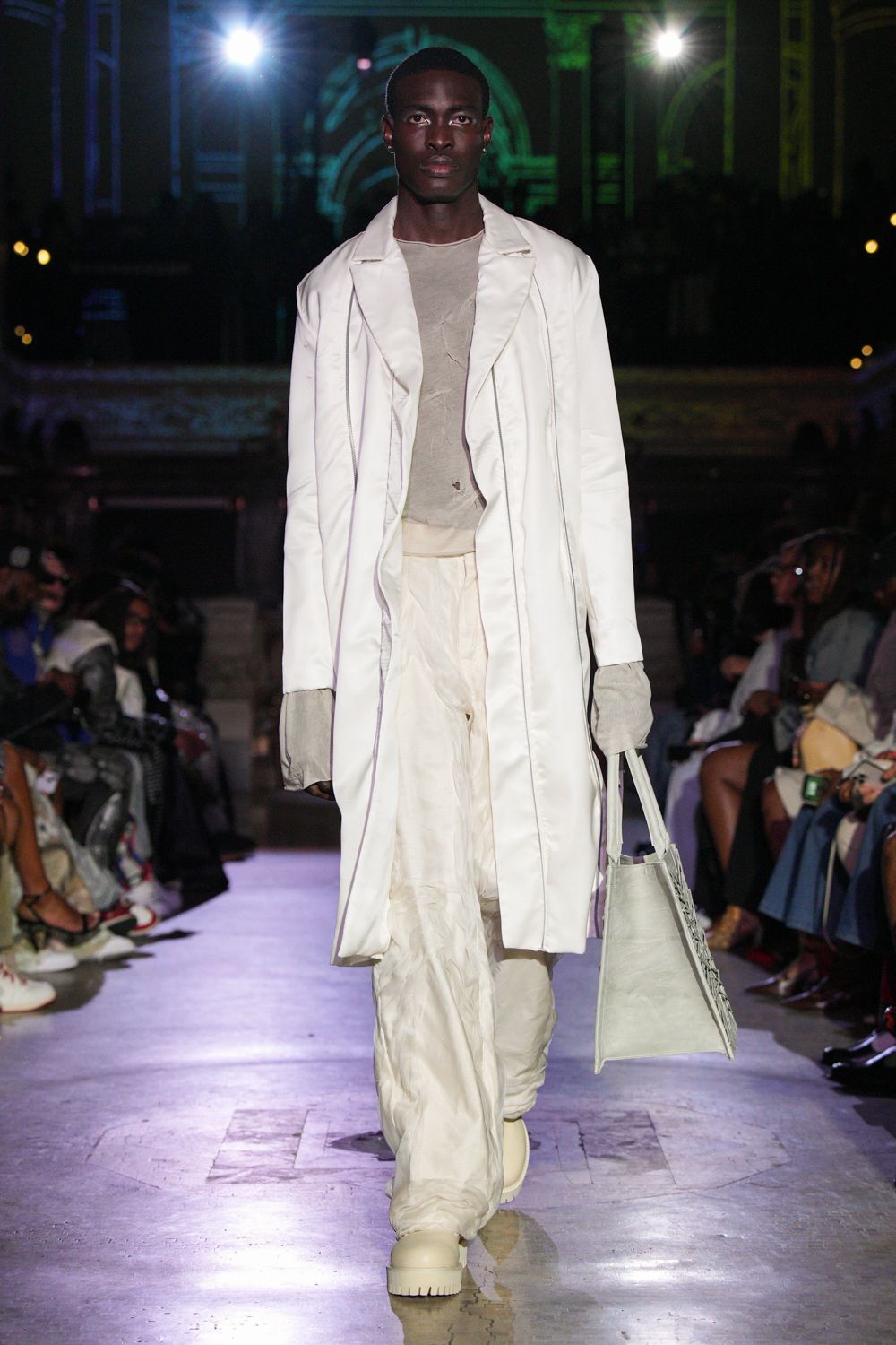 white coat gray top relaxed pants