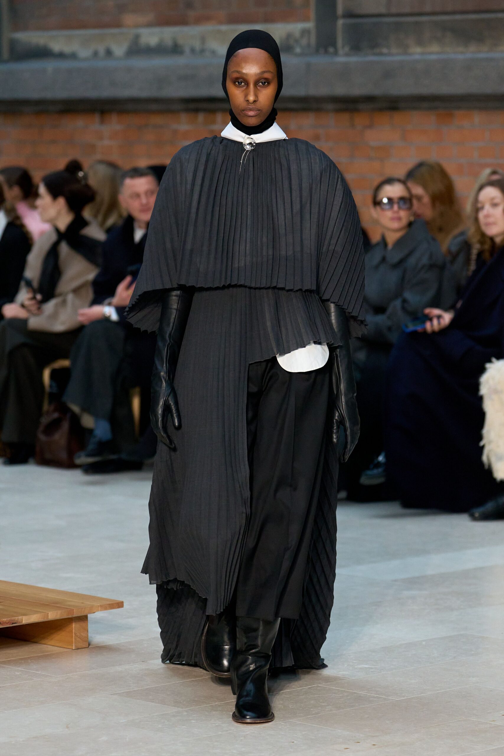 black pleated cape with shirt