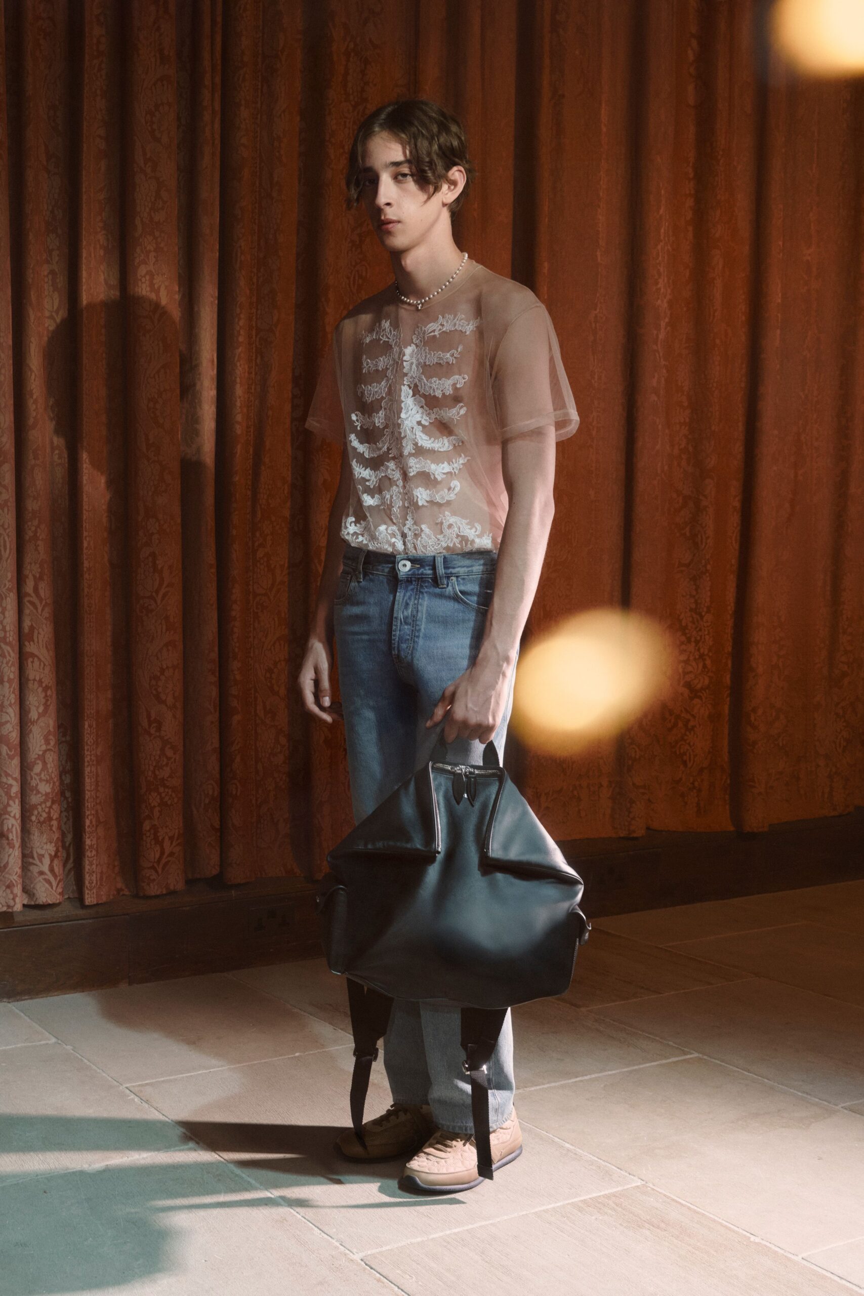 sheer white embroidered top with jeans