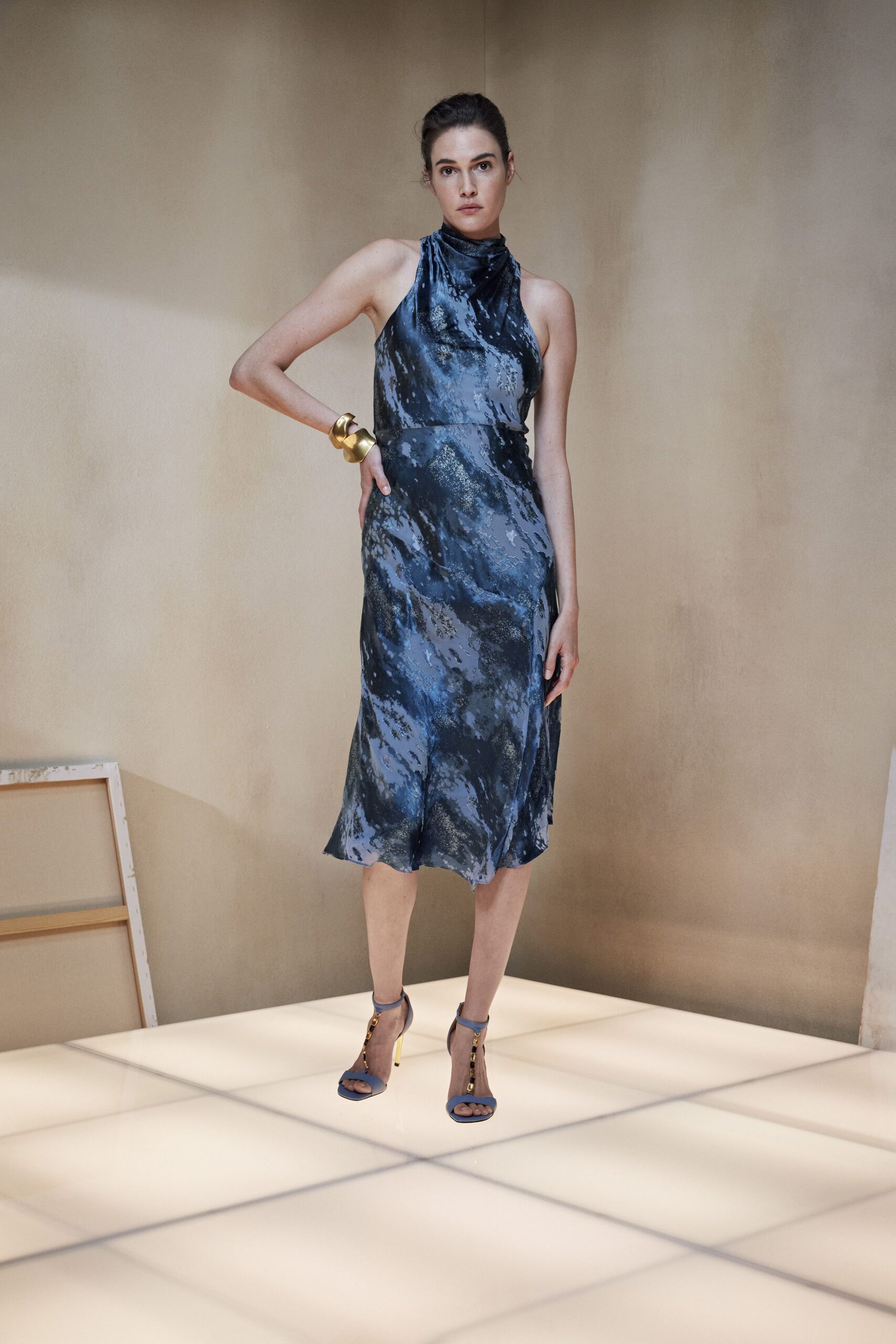 blue silk sleeveless high-neck fitted draped flowing dress
