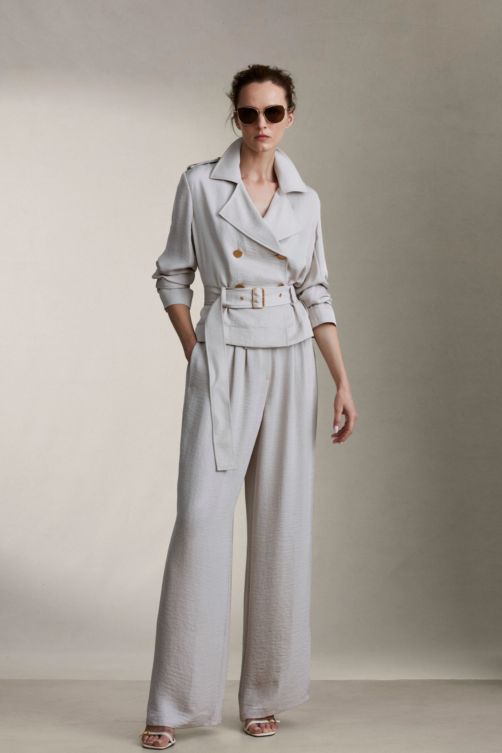 beige tailored trench coat with wide-leg pants