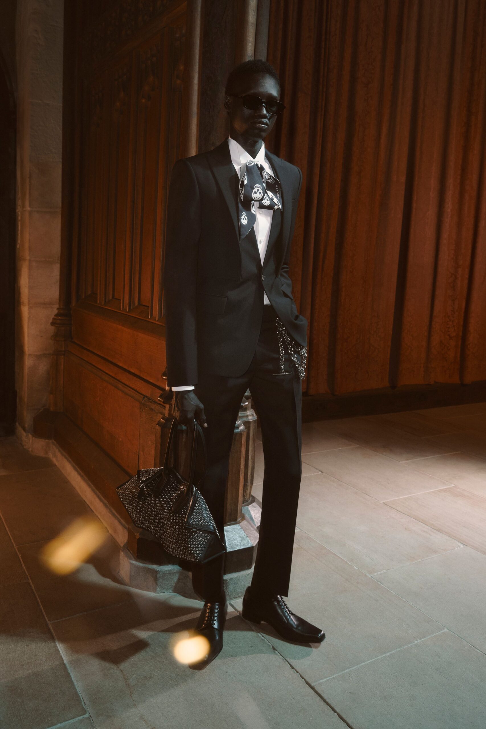 black tailored suit with white shirt